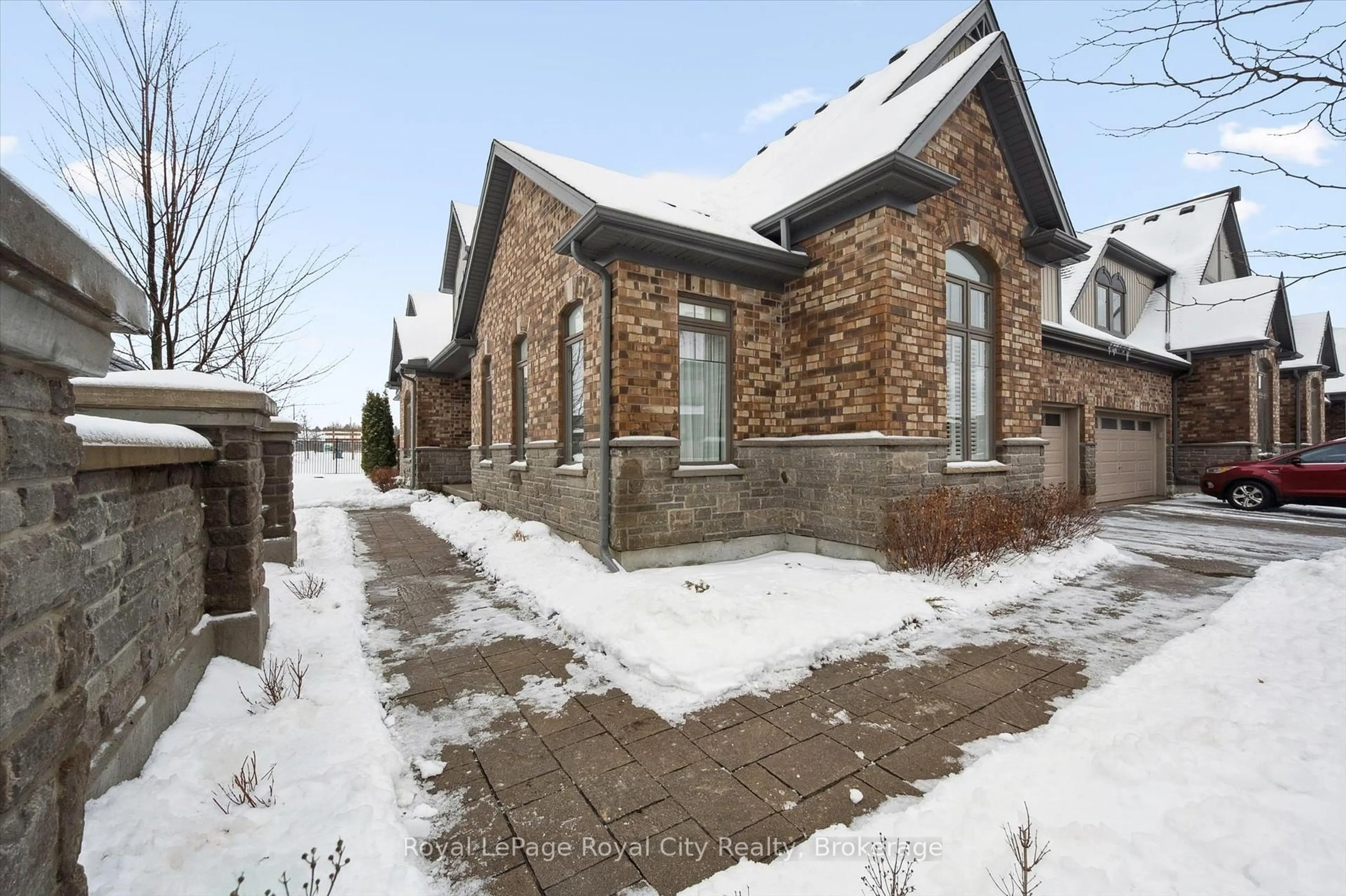 Home with brick exterior material, street for 39 Kay Cres #1, Guelph Ontario N1L 0N5