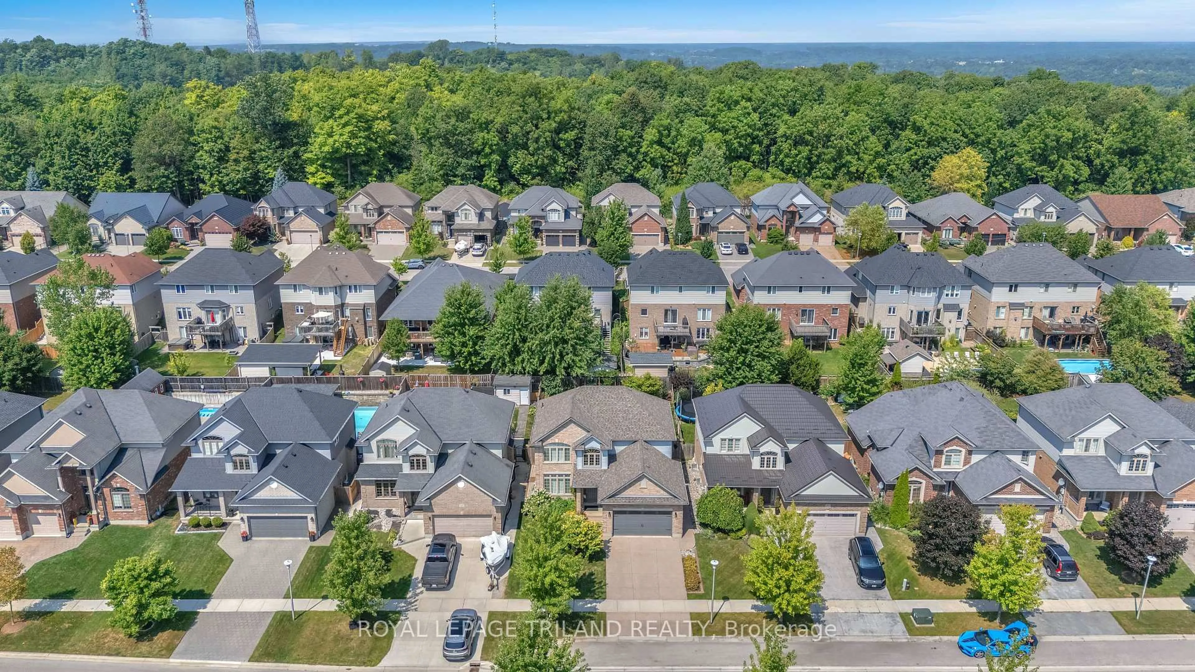 A pic from outside/outdoor area/front of a property/back of a property/a pic from drone, city buildings view from balcony for 823 Longworth Rd, London South Ontario N6K 0B6