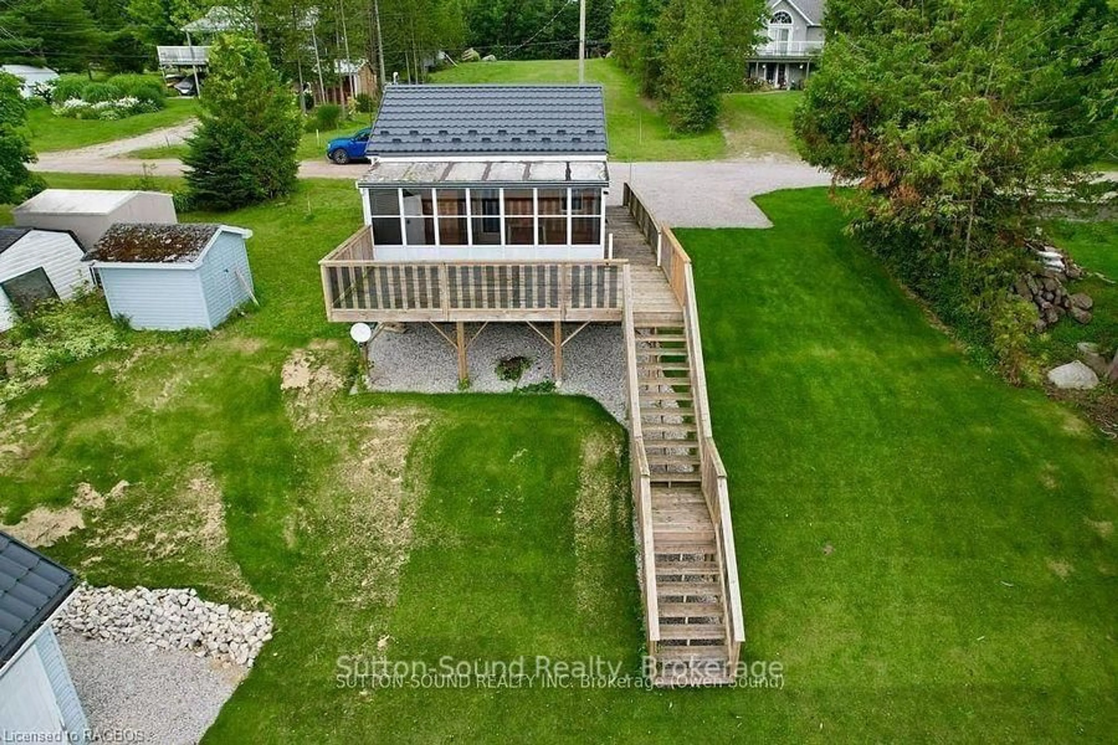A pic from outside/outdoor area/front of a property/back of a property/a pic from drone, water/lake/river/ocean view for 38 Island View Dr, South Bruce Peninsula Ontario N0H 1A0