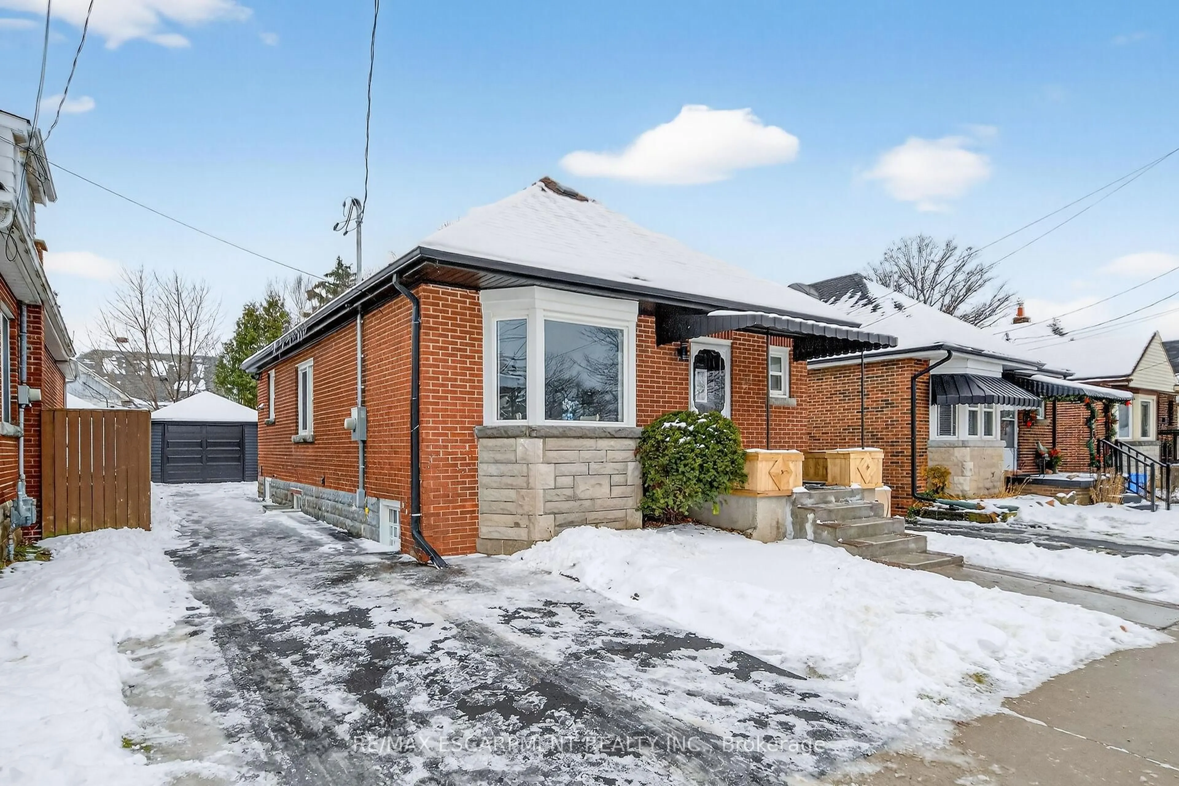 Home with brick exterior material, street for 150 BRUCEDALE Ave, Hamilton Ontario L9A 1N6