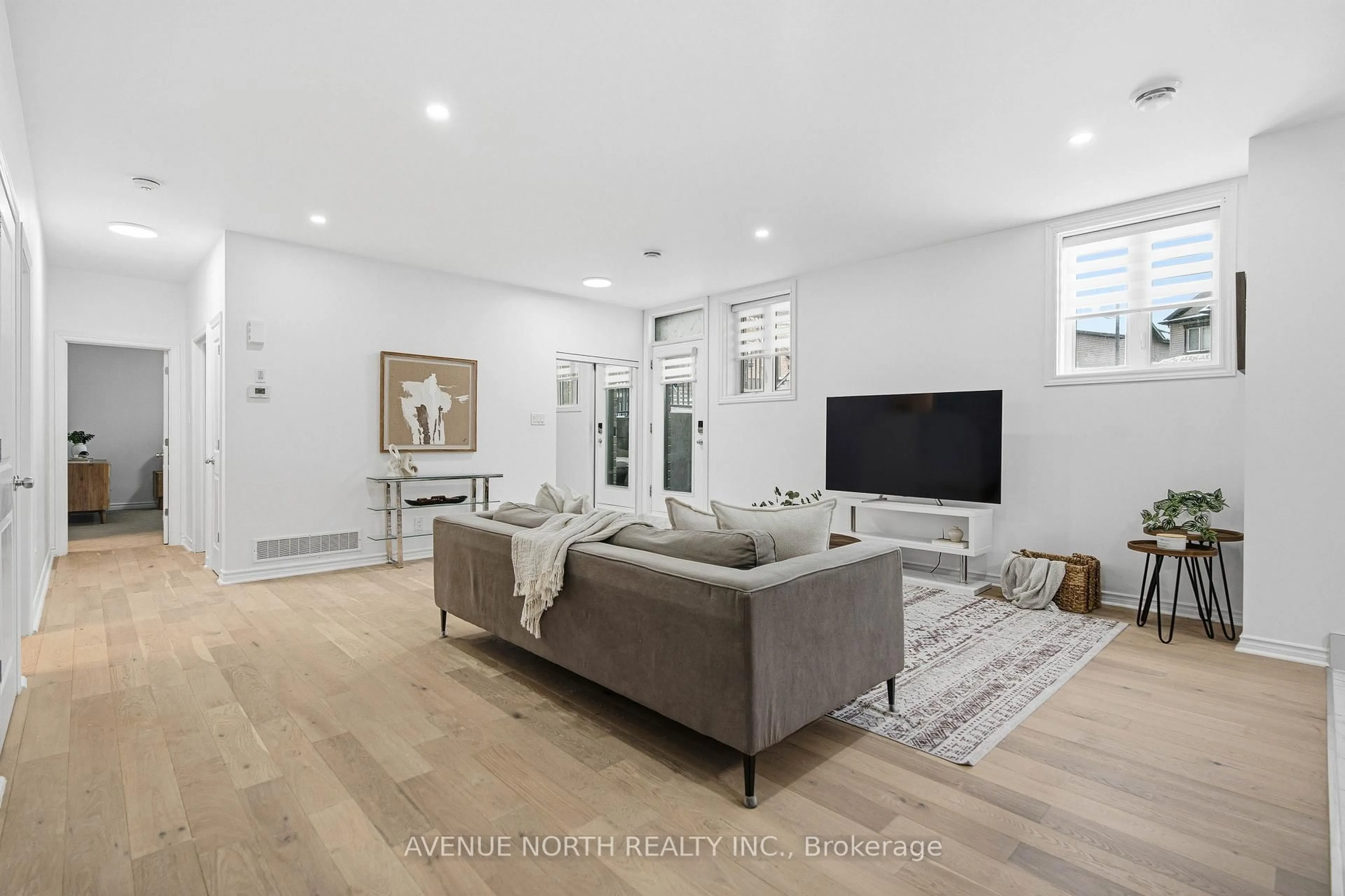 Living room with furniture, unknown for 725 Dearborn Private #Unit J, Ottawa Ontario K1T 0W4