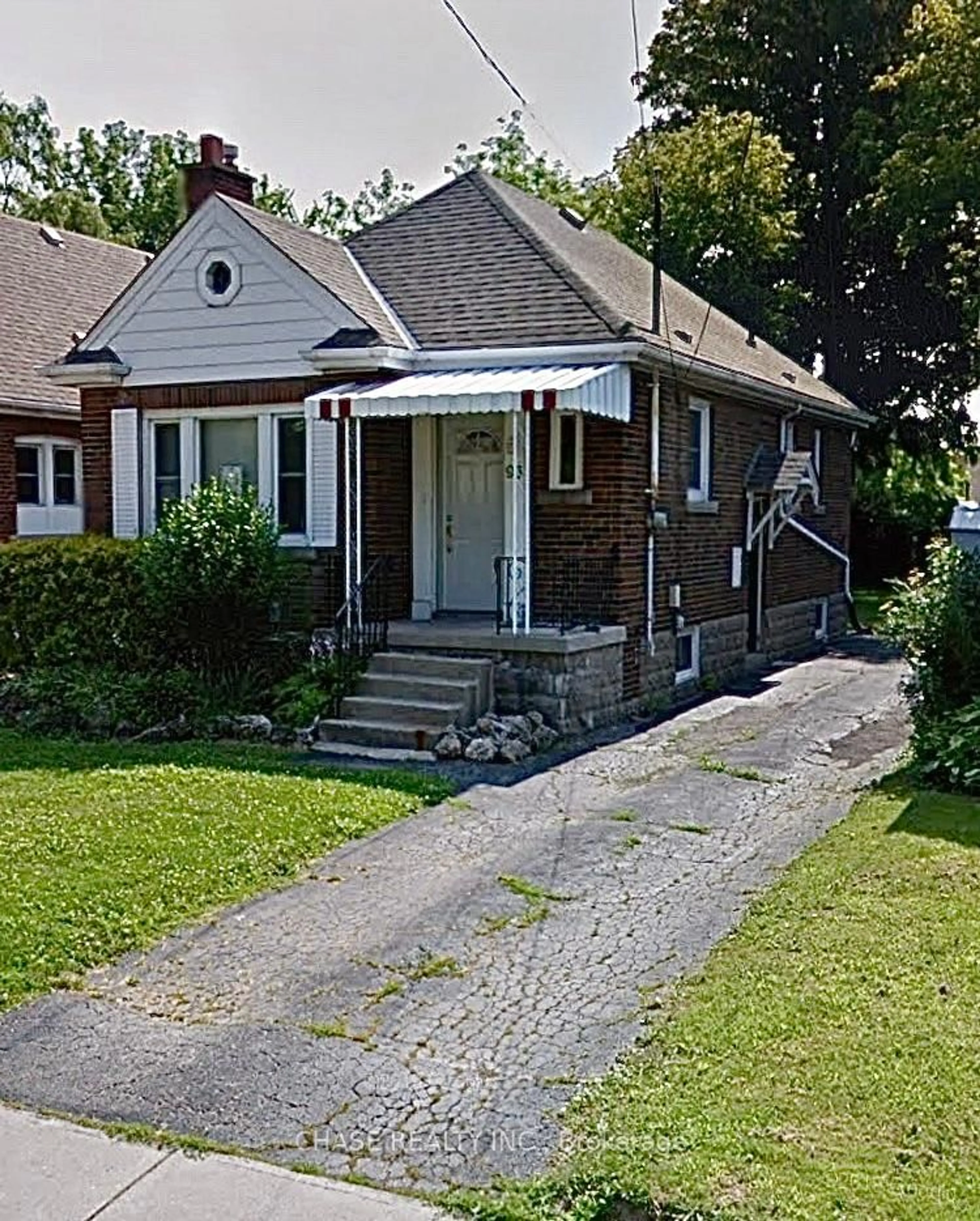 Home with brick exterior material, street for 93 Haddon Ave, Hamilton Ontario L8S 1X7