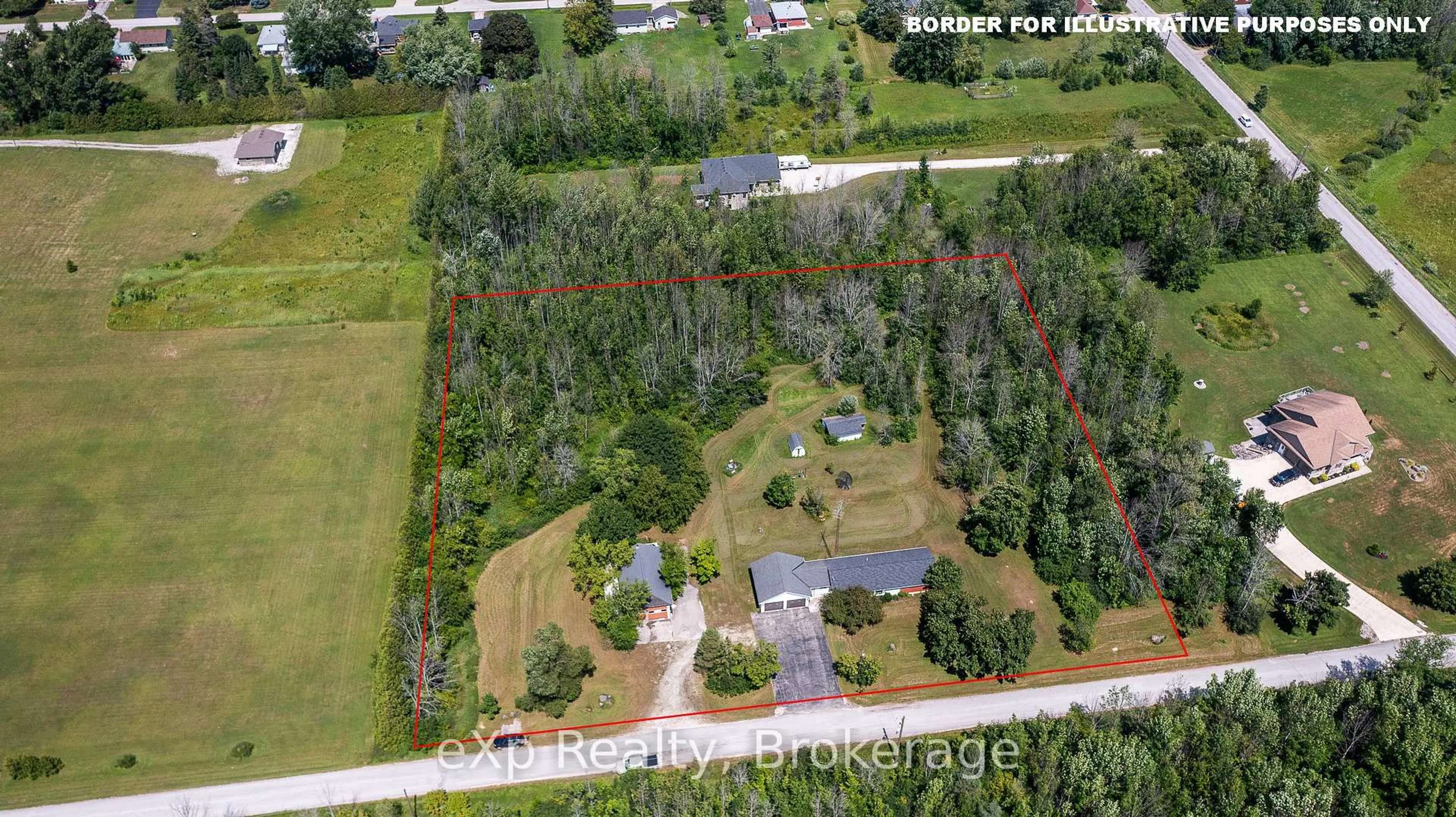 A pic from outside/outdoor area/front of a property/back of a property/a pic from drone, forest/trees view for 873 14th St, Georgian Bluffs Ontario N4K 6V5