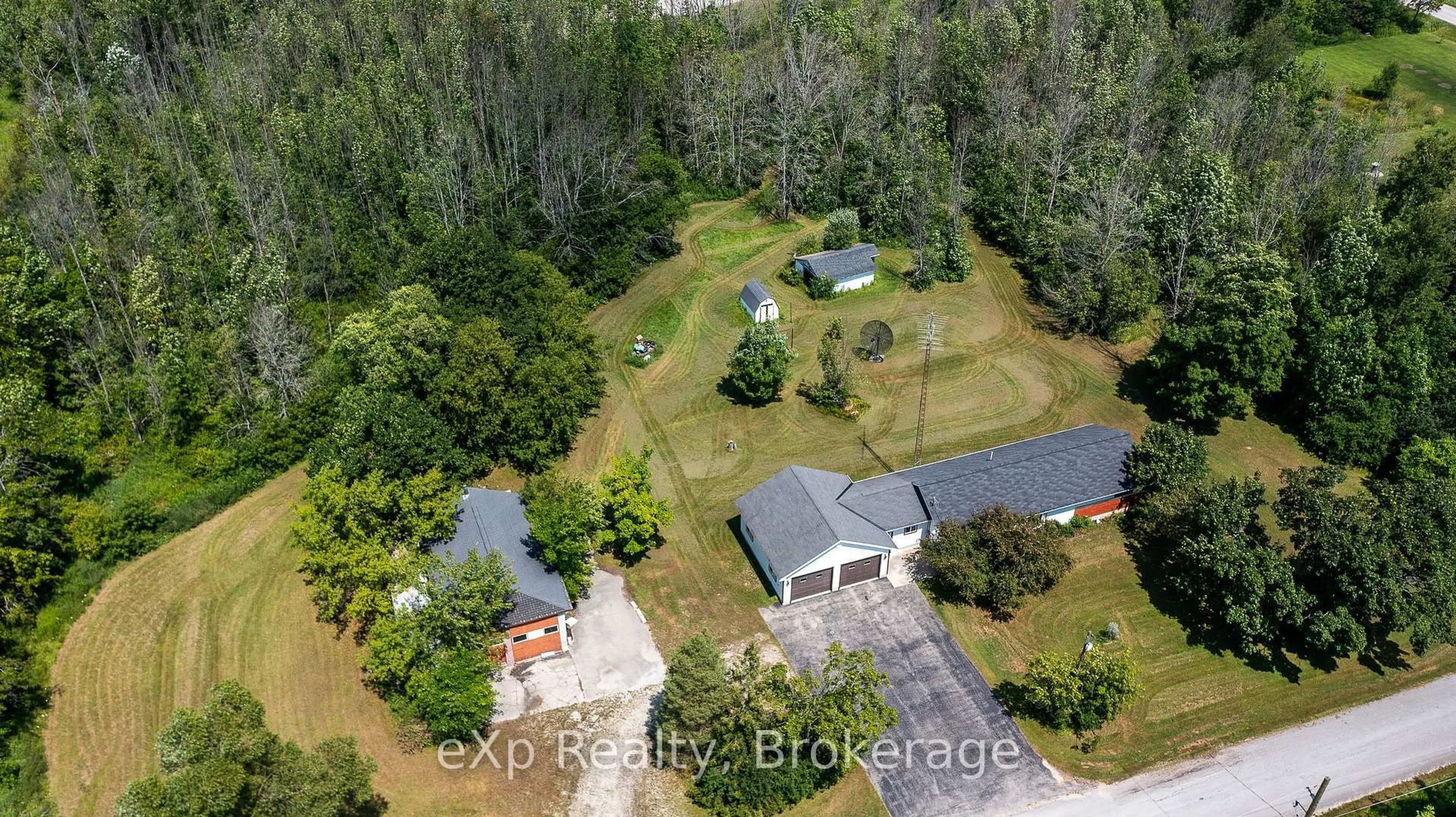 A pic from outside/outdoor area/front of a property/back of a property/a pic from drone, street for 873 14th St, Georgian Bluffs Ontario N4K 6V5