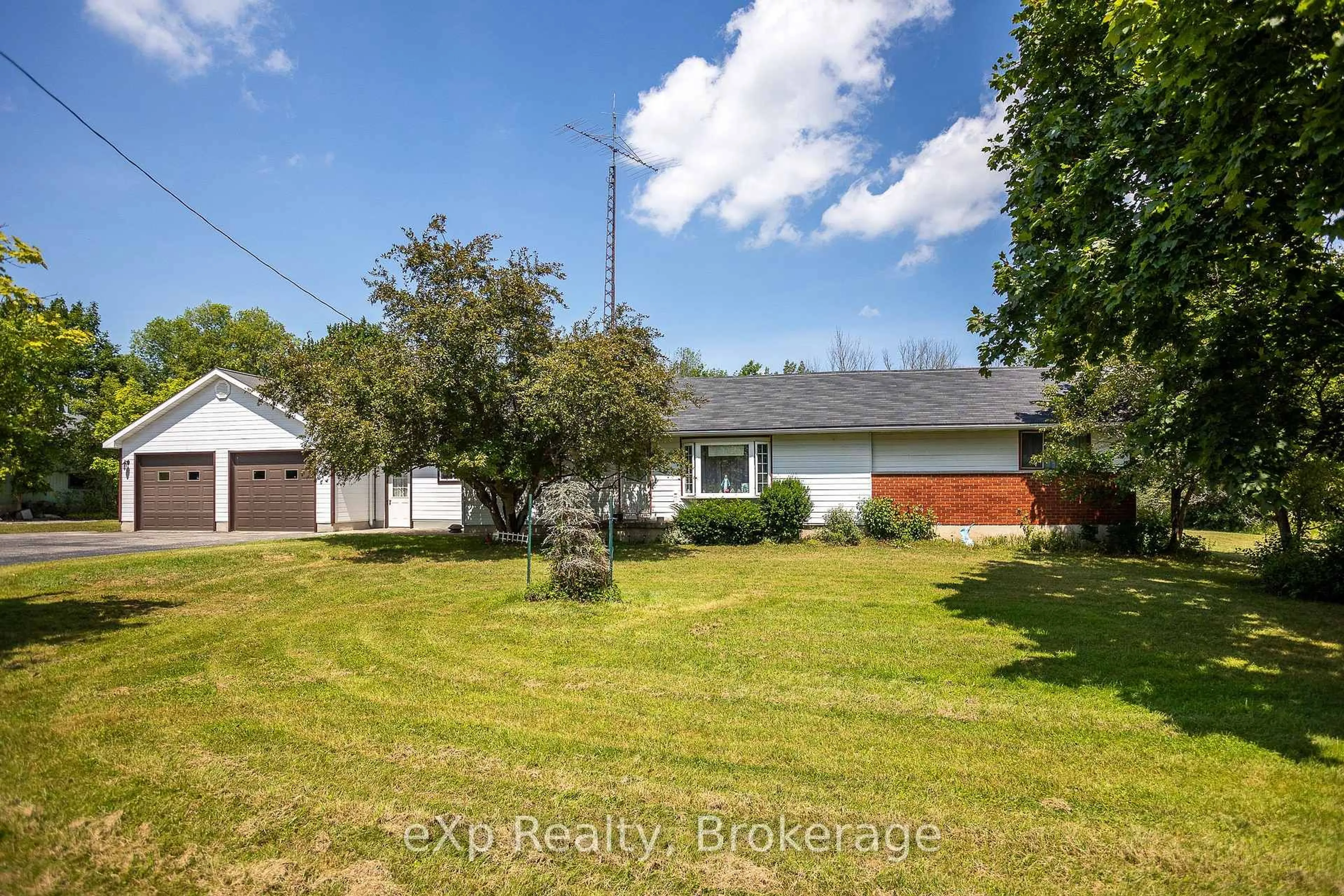 A pic from outside/outdoor area/front of a property/back of a property/a pic from drone, street for 873 14th St, Georgian Bluffs Ontario N4K 6V5