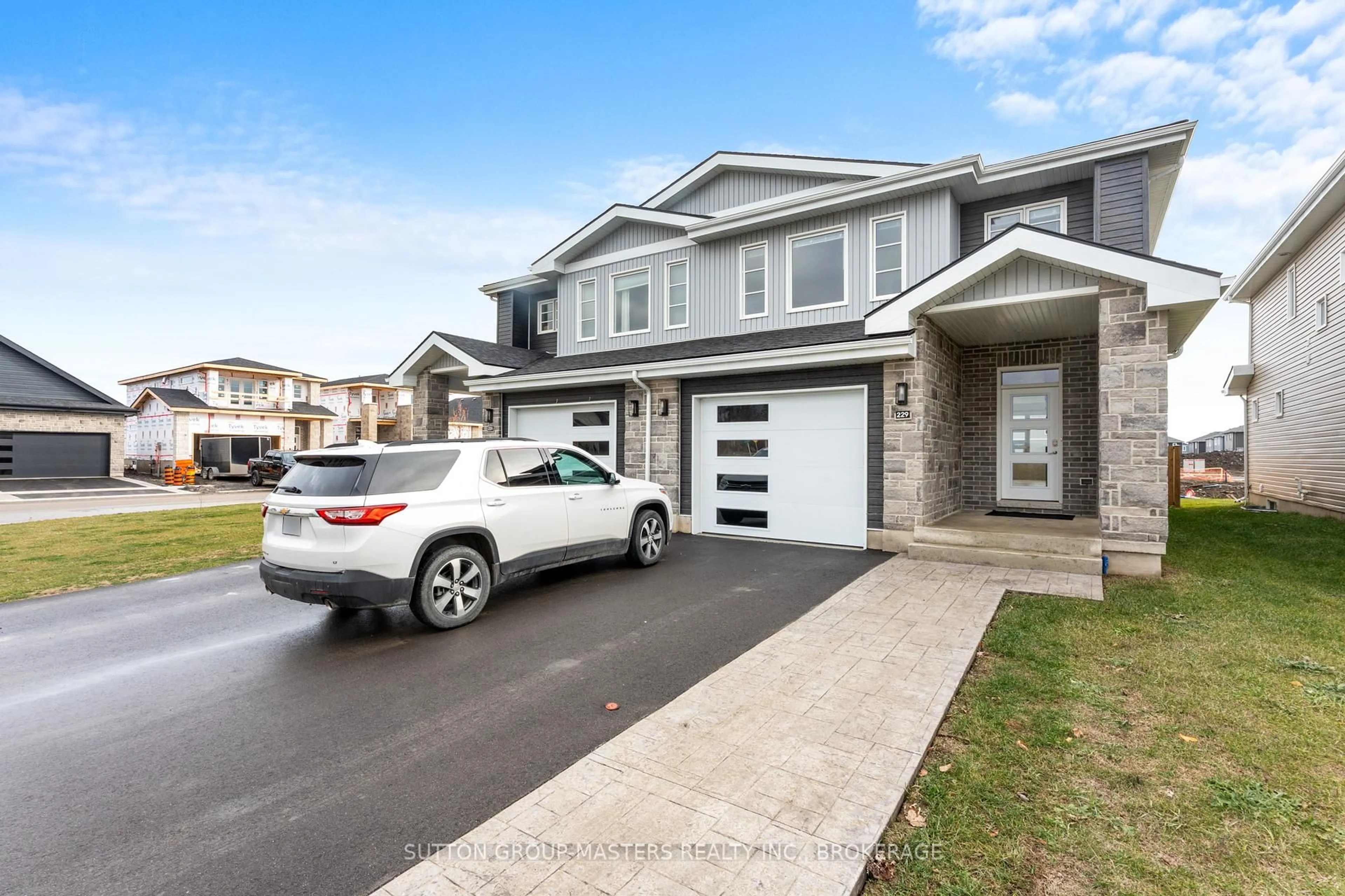 Home with vinyl exterior material, street for 229 Superior Dr, Loyalist Ontario K7N 0E9