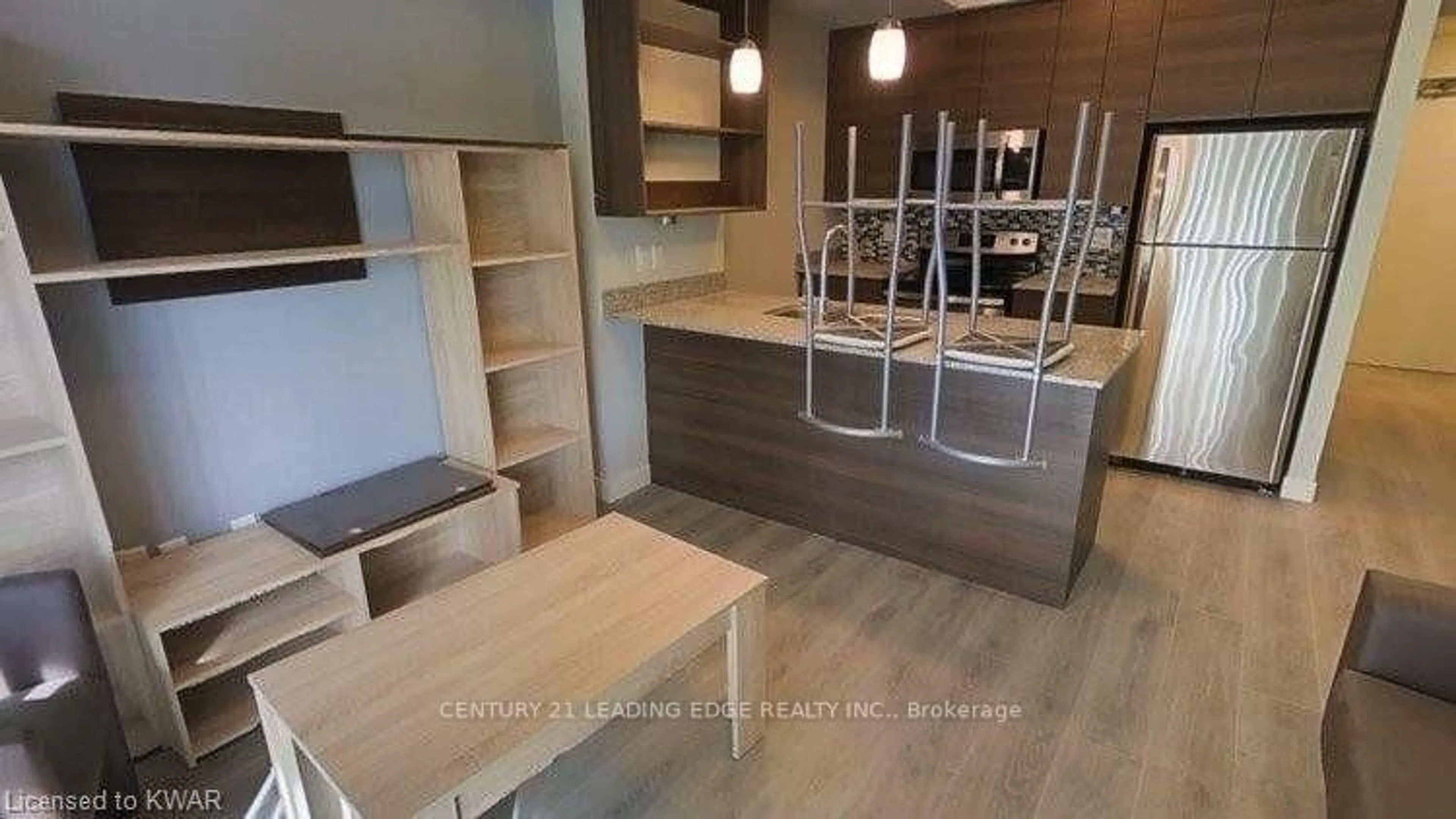 Open concept kitchen, wood/laminate floor for 318 Spruce St #910, Waterloo Ontario N2L 0E9