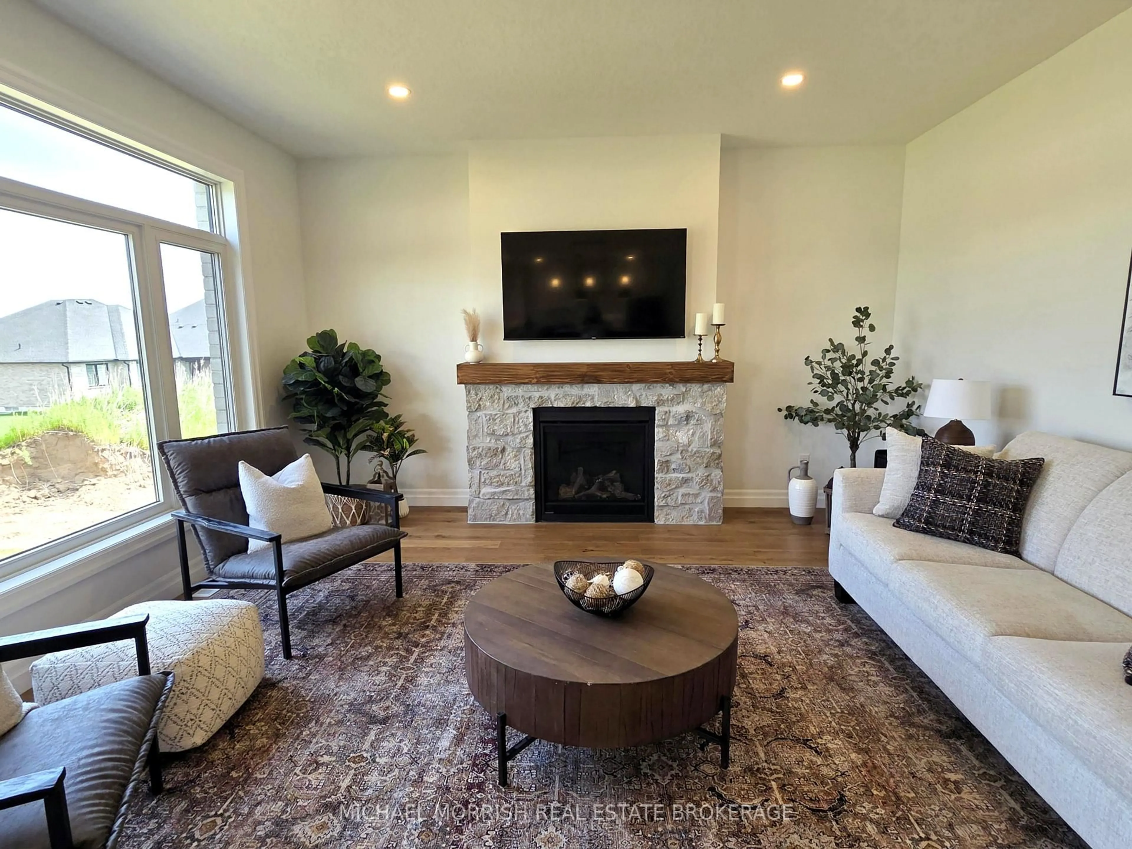 Living room with furniture, unknown for 230 Harvest Lane, Thames Centre Ontario N0L 1G2