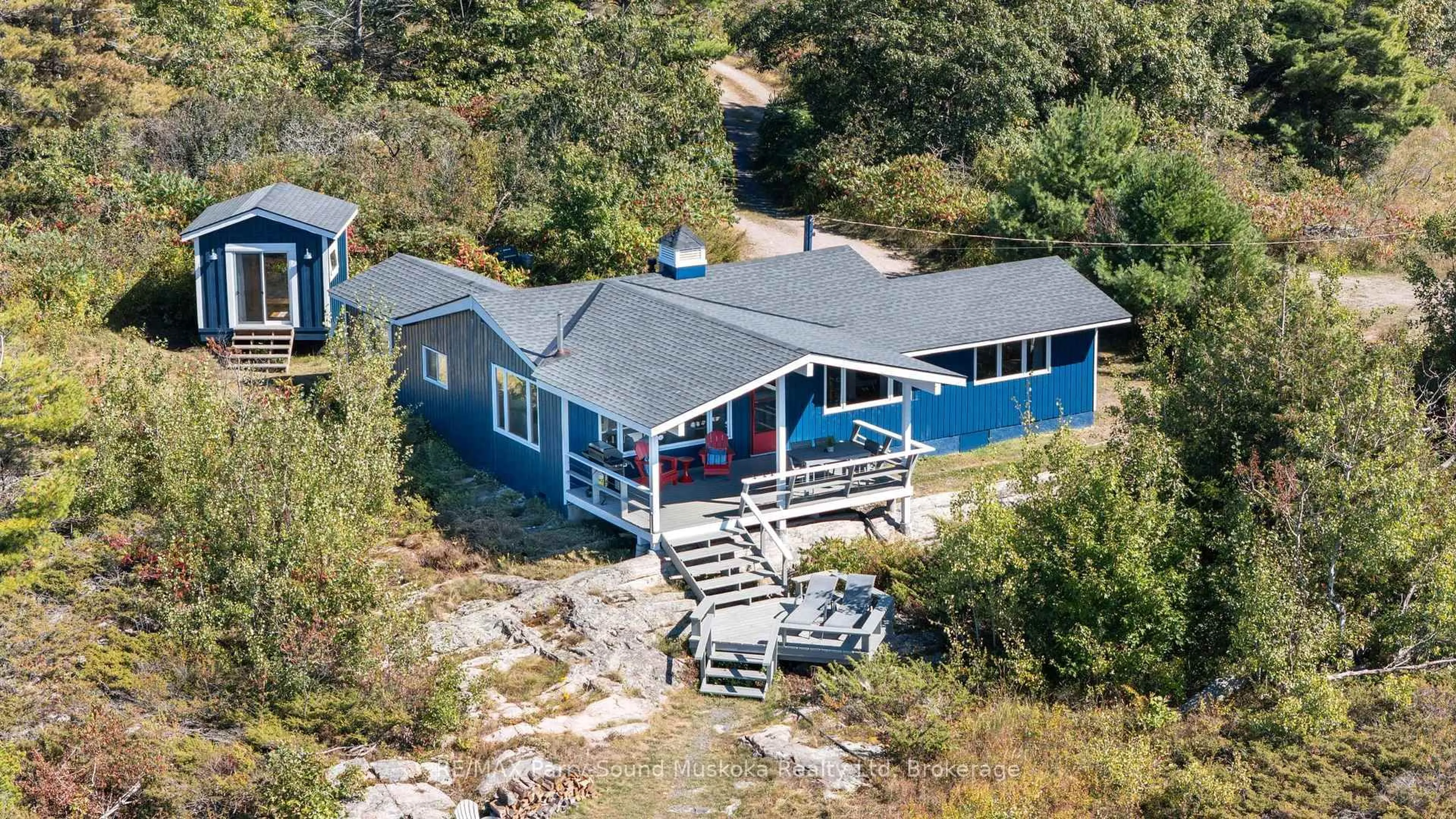 A pic from outside/outdoor area/front of a property/back of a property/a pic from drone, water/lake/river/ocean view for 15 Forsyths Rd, Carling Ontario P0G 1G0