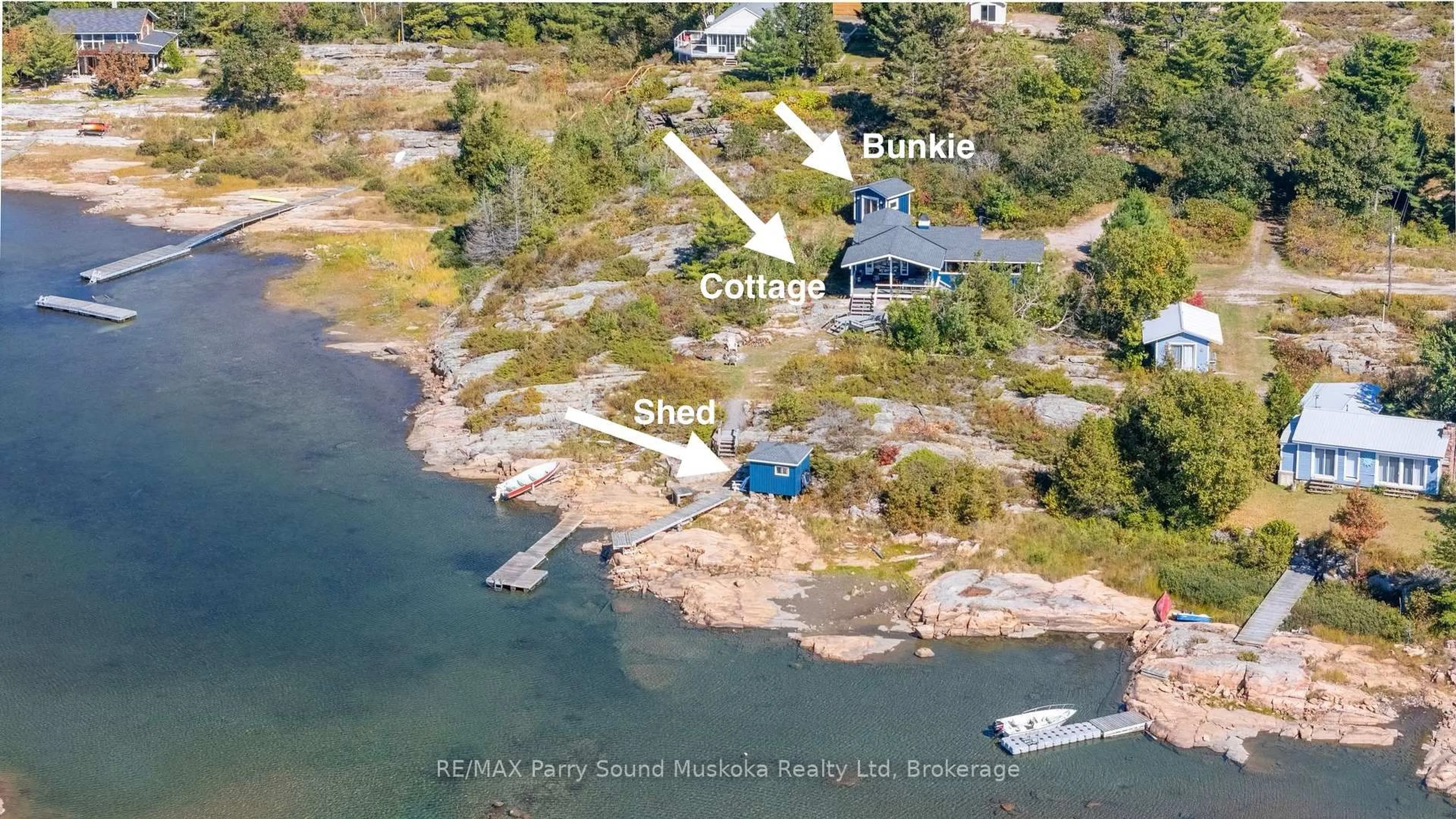 A pic from outside/outdoor area/front of a property/back of a property/a pic from drone, water/lake/river/ocean view for 15 Forsyths Rd, Carling Ontario P0G 1G0