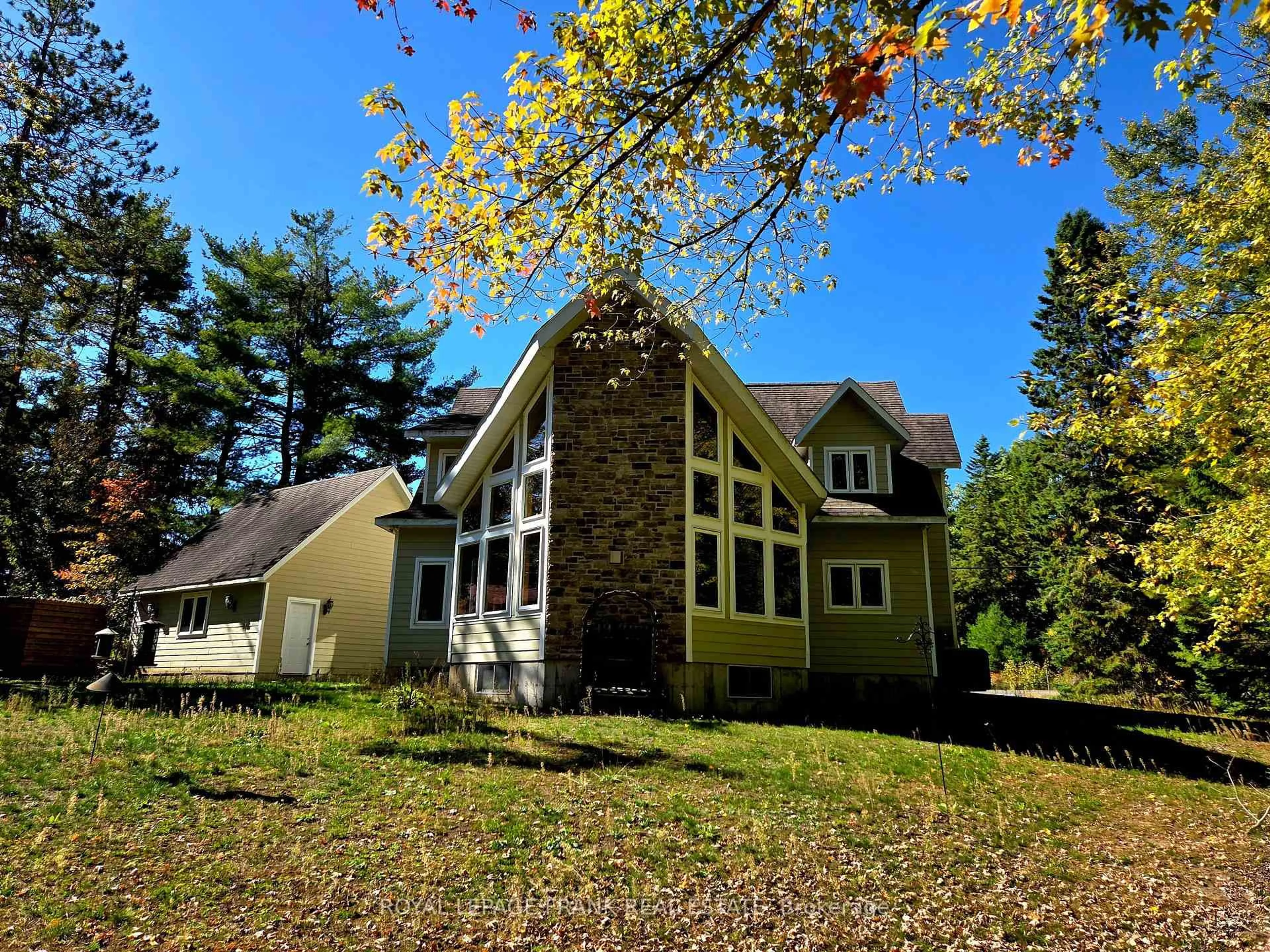 A pic from outside/outdoor area/front of a property/back of a property/a pic from drone, unknown for 8847 Highway 28, North Kawartha Ontario K0L 1A0