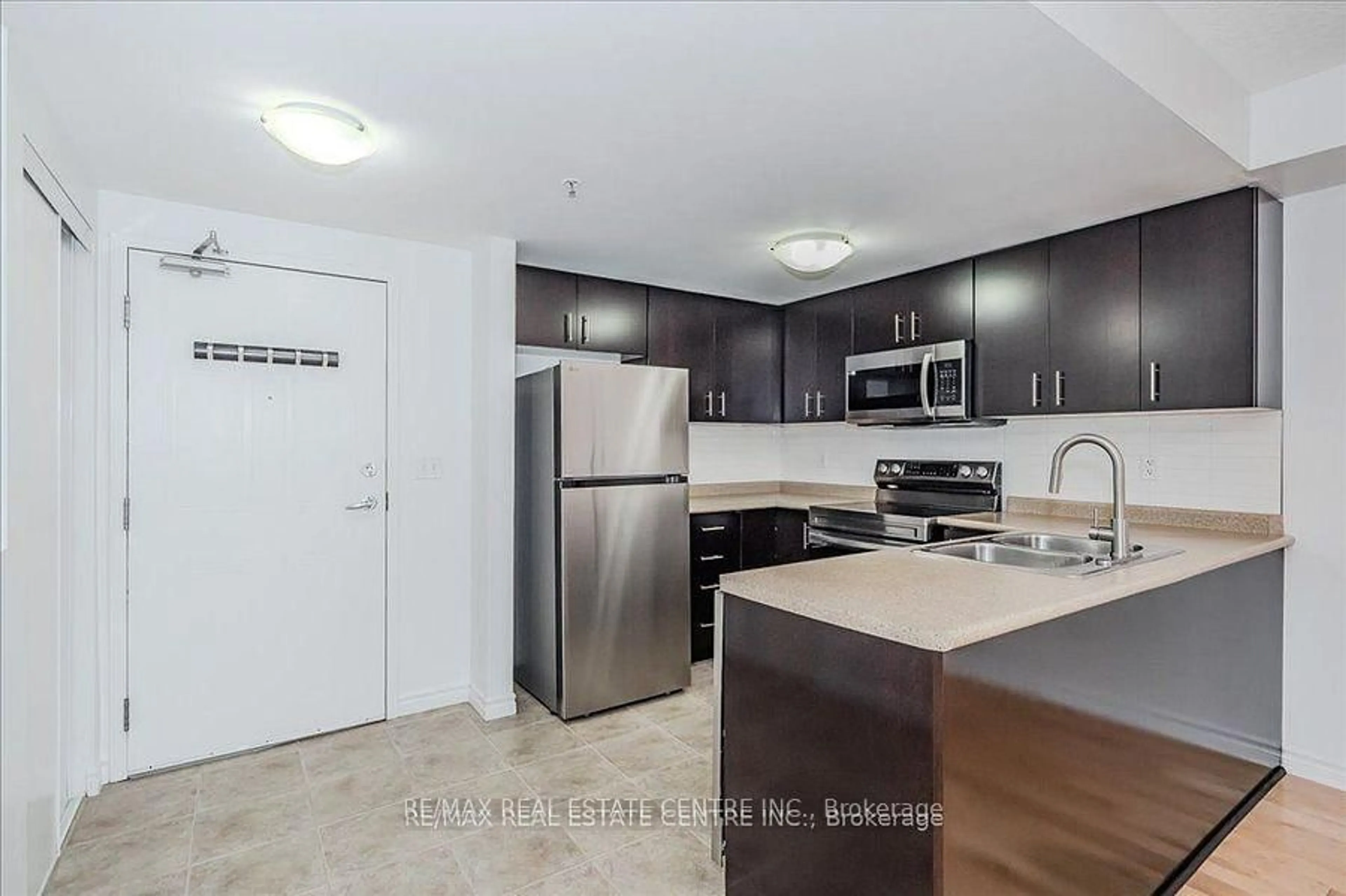 Standard kitchen, unknown for 41 Goodwin Dr #202, Guelph Ontario N1L 0E7