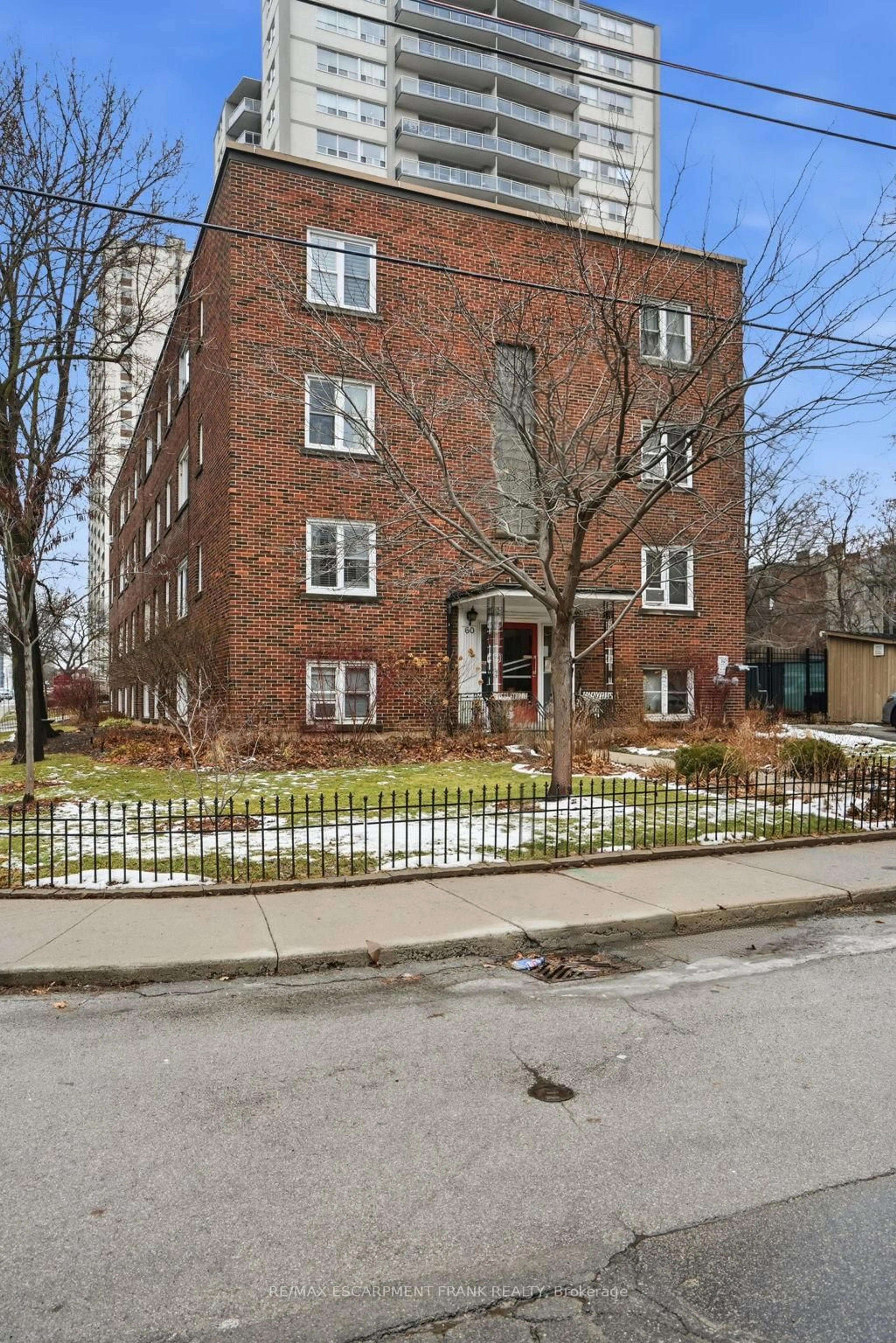 Home with brick exterior material, street for 60 ROBINSON St #104, Hamilton Ontario L8P 1Y9