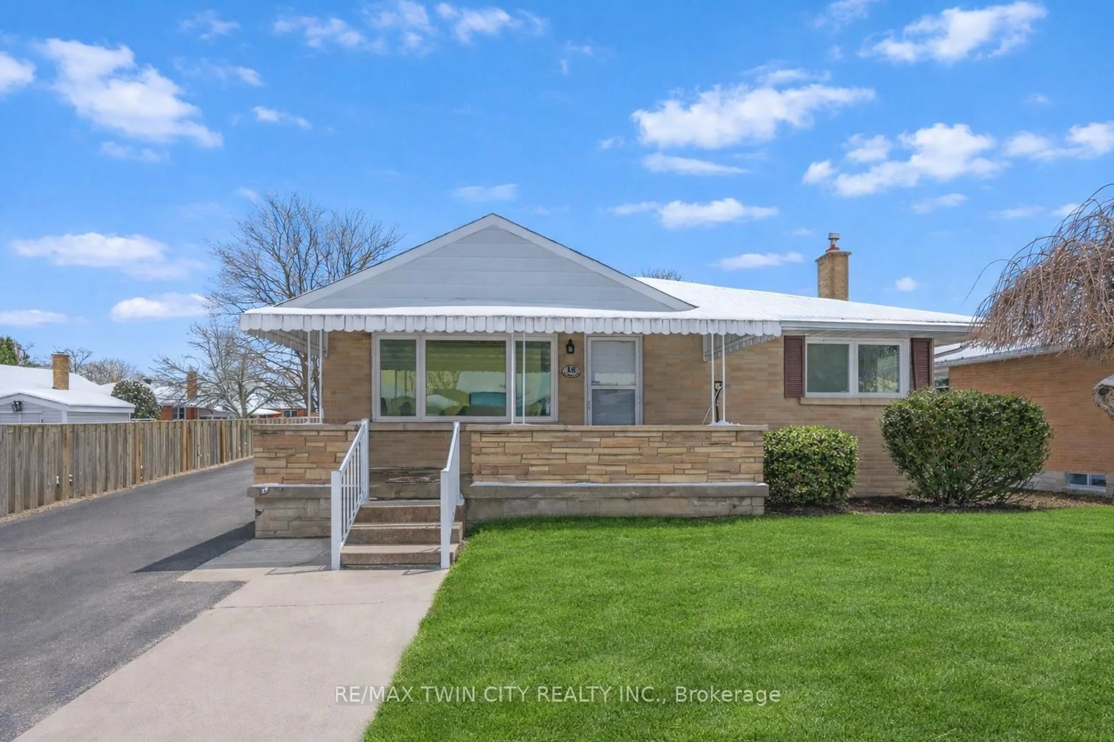 Home with vinyl exterior material, street for 18 Harber Ave, Kitchener Ontario N2C 1Y8