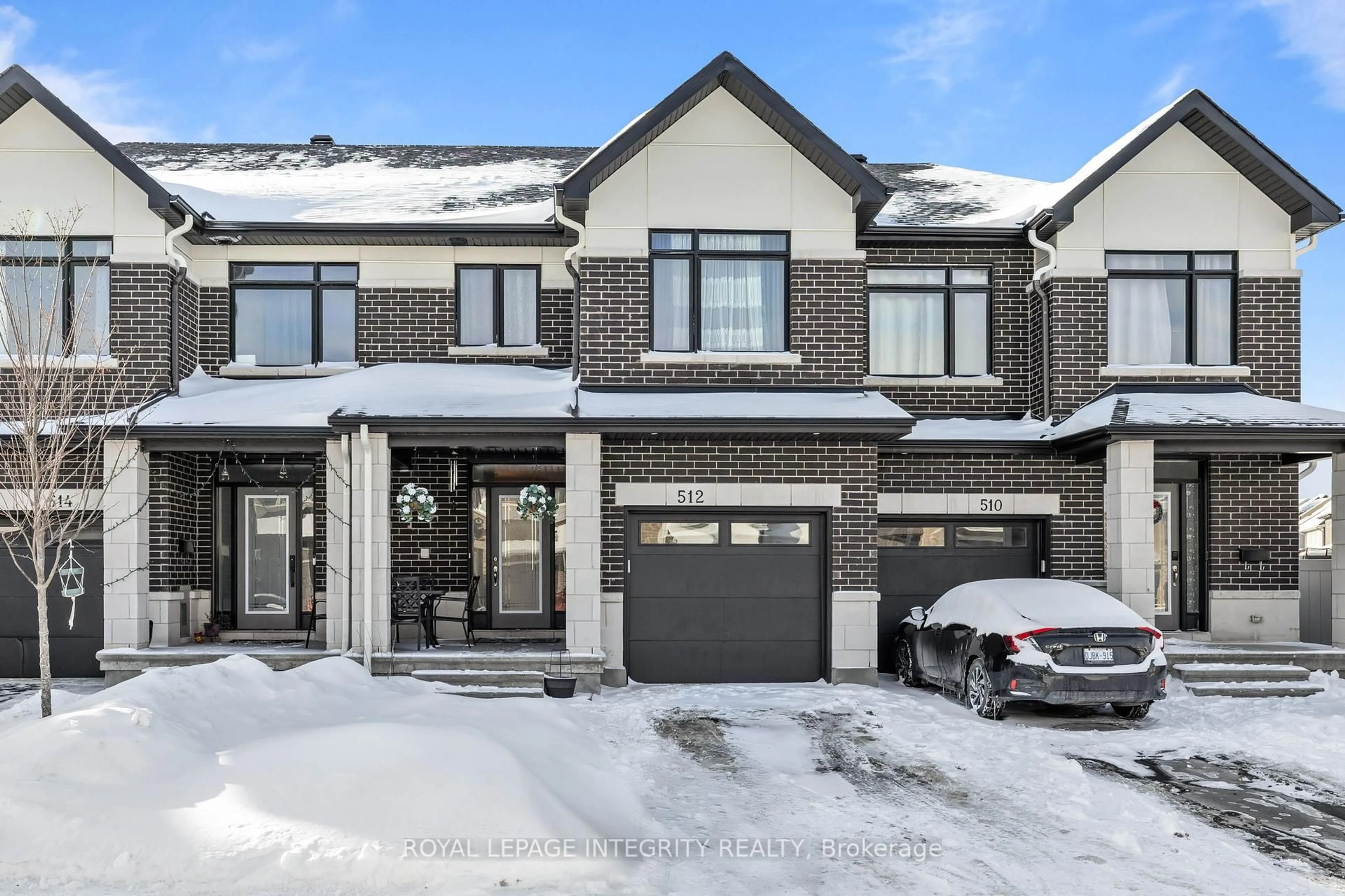 Home with brick exterior material, street for 512 Cardamom Terr, Ottawa Ontario K2S 2X9