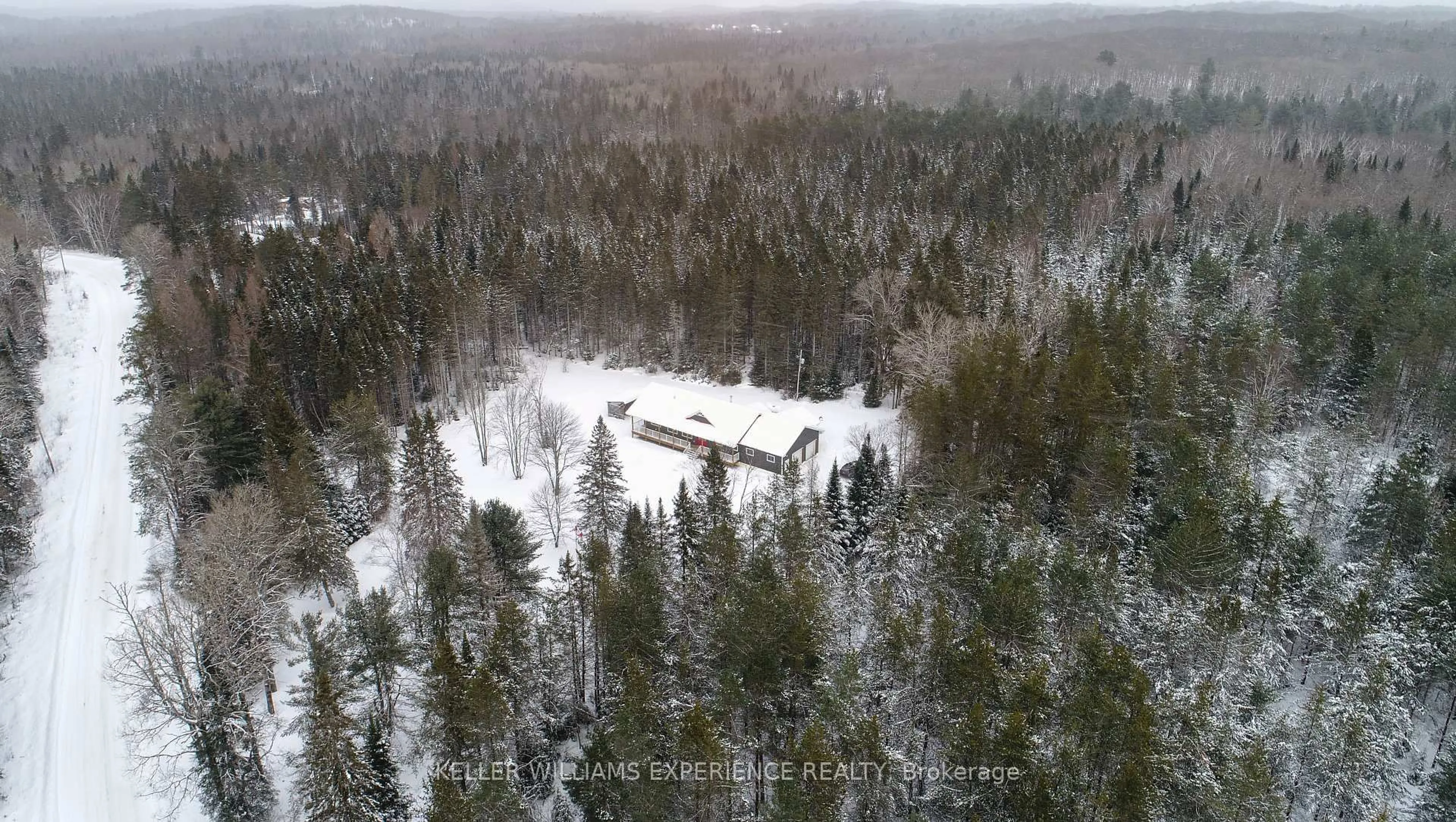 A pic from outside/outdoor area/front of a property/back of a property/a pic from drone, forest/trees view for 213 Yearley Rd, McMurrich/Monteith Ontario P0A 1Y0