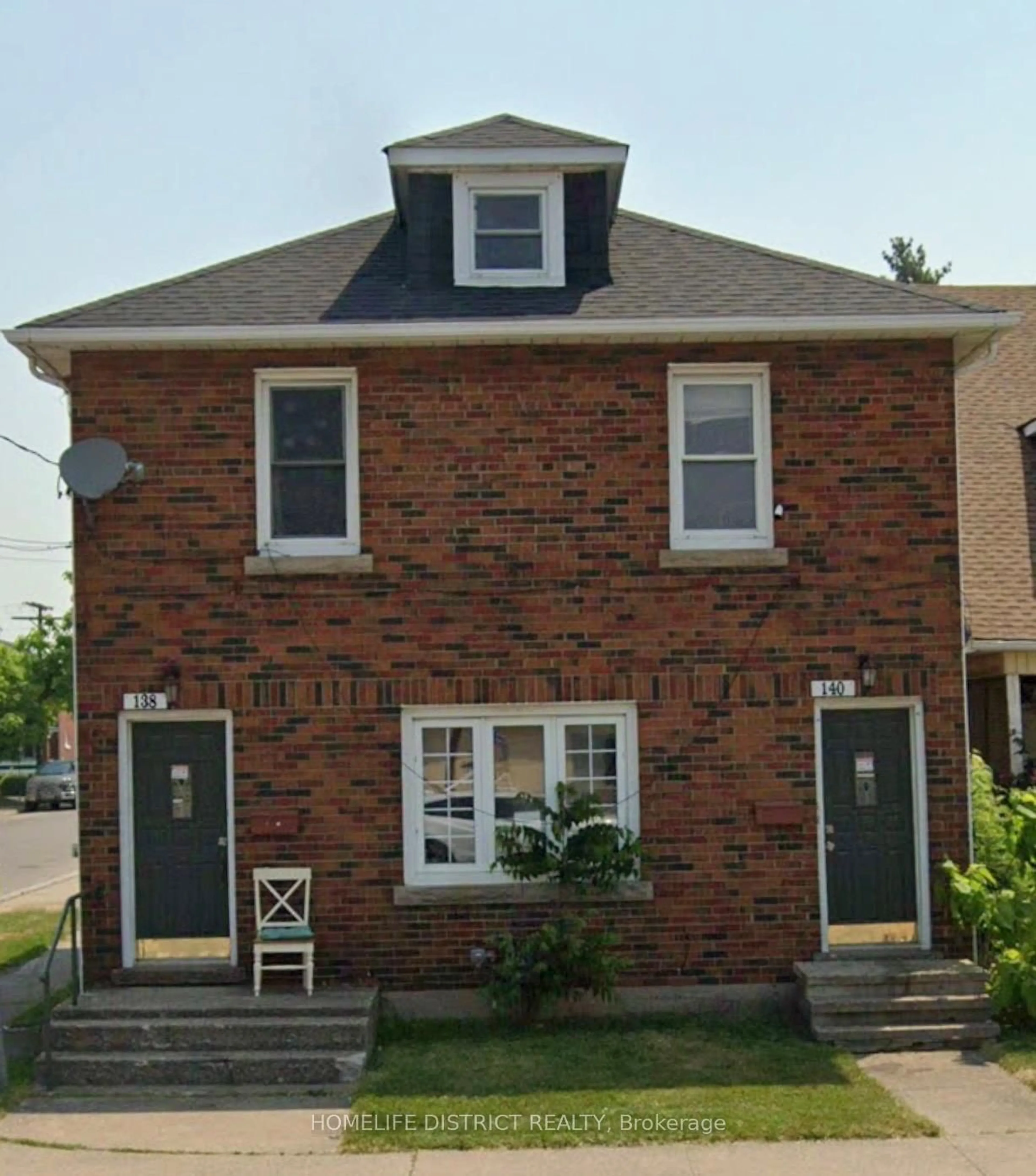 Home with brick exterior material, street for 138 -140 Crowland Ave, Welland Ontario L3B 1X3