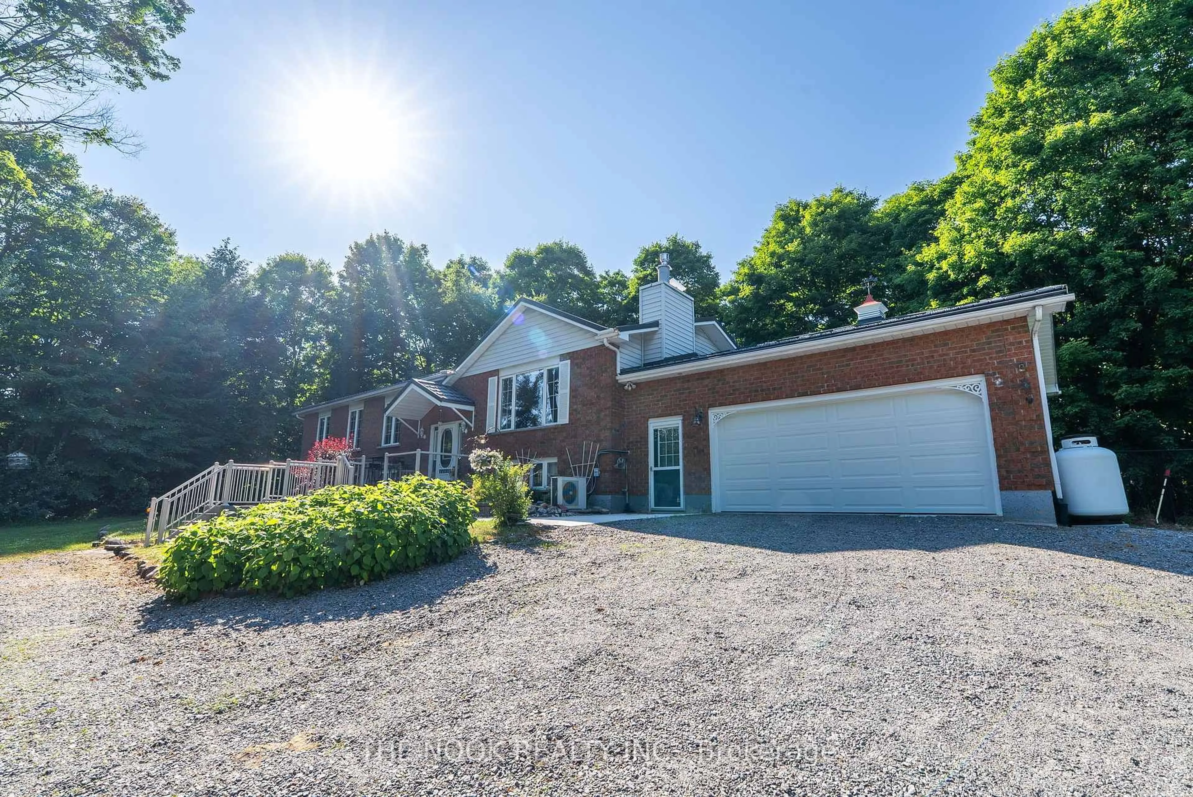 A pic from outside/outdoor area/front of a property/back of a property/a pic from drone, street for 12482 Highway 28 Rd, North Kawartha Ontario K0L 1A0