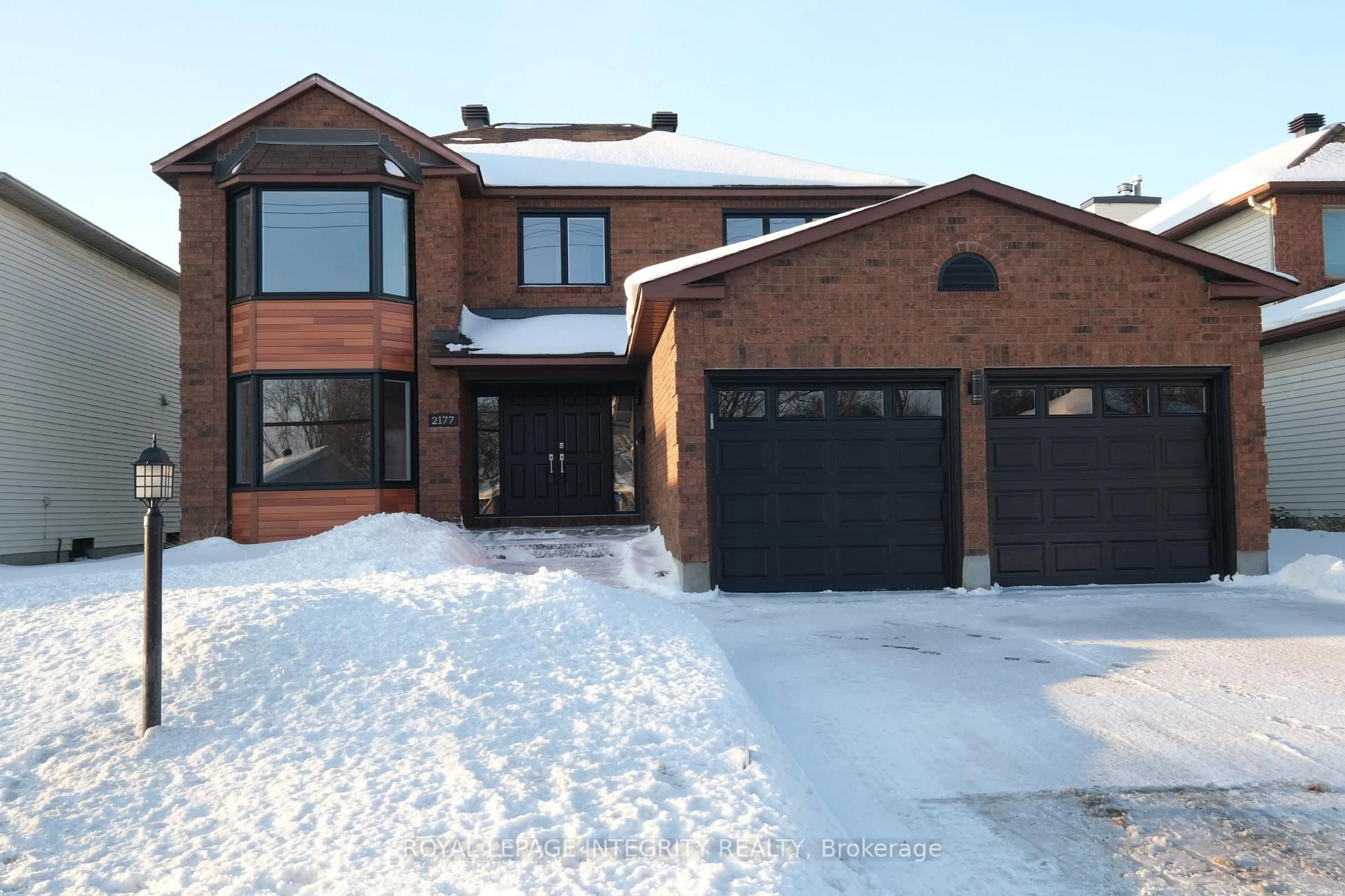 Home with brick exterior material, street for 2177 Lenester Ave, Ottawa Ontario K2A 4A9