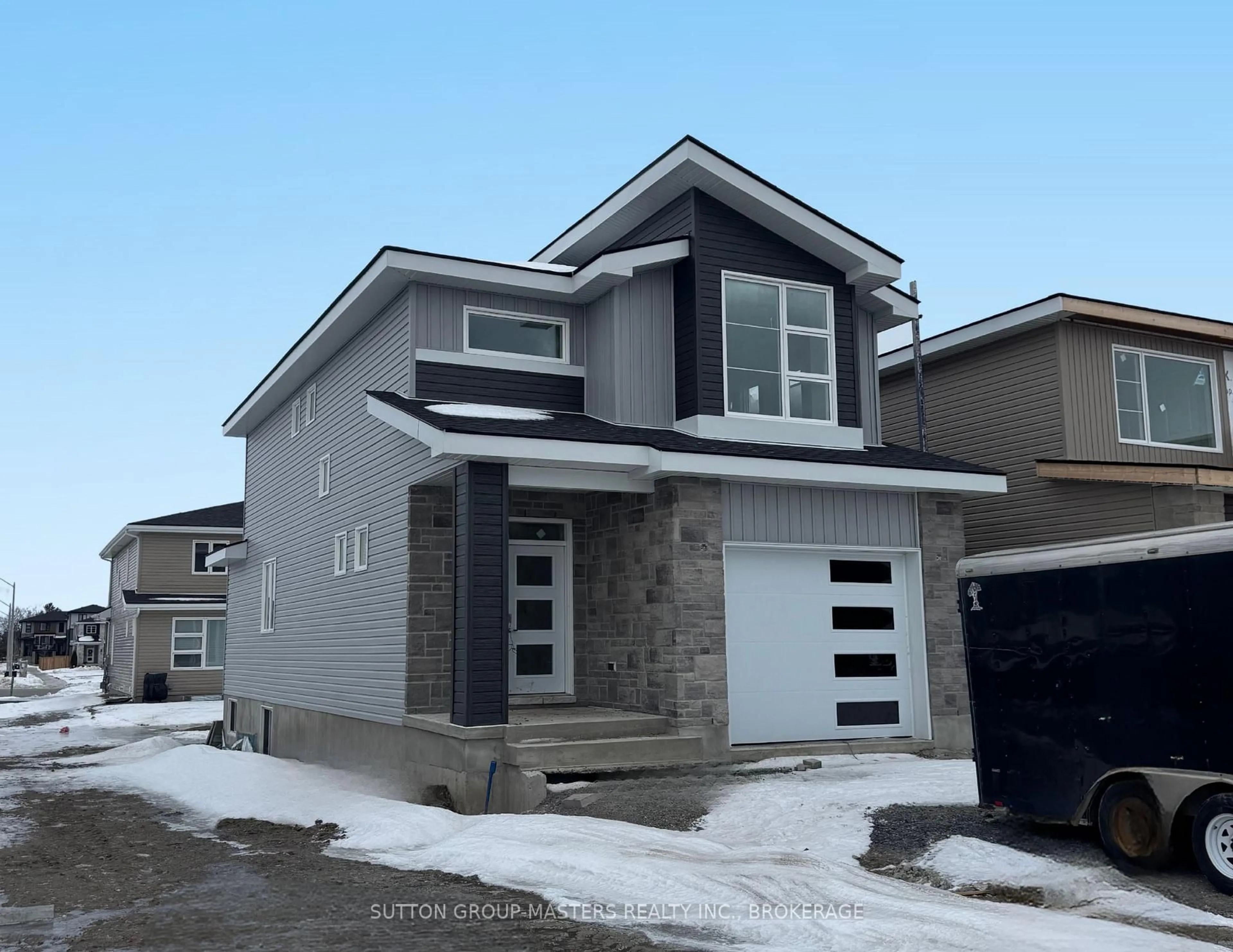 Home with vinyl exterior material, street for 230 Dr Richard James Cres, Loyalist Ontario K7N 0E5