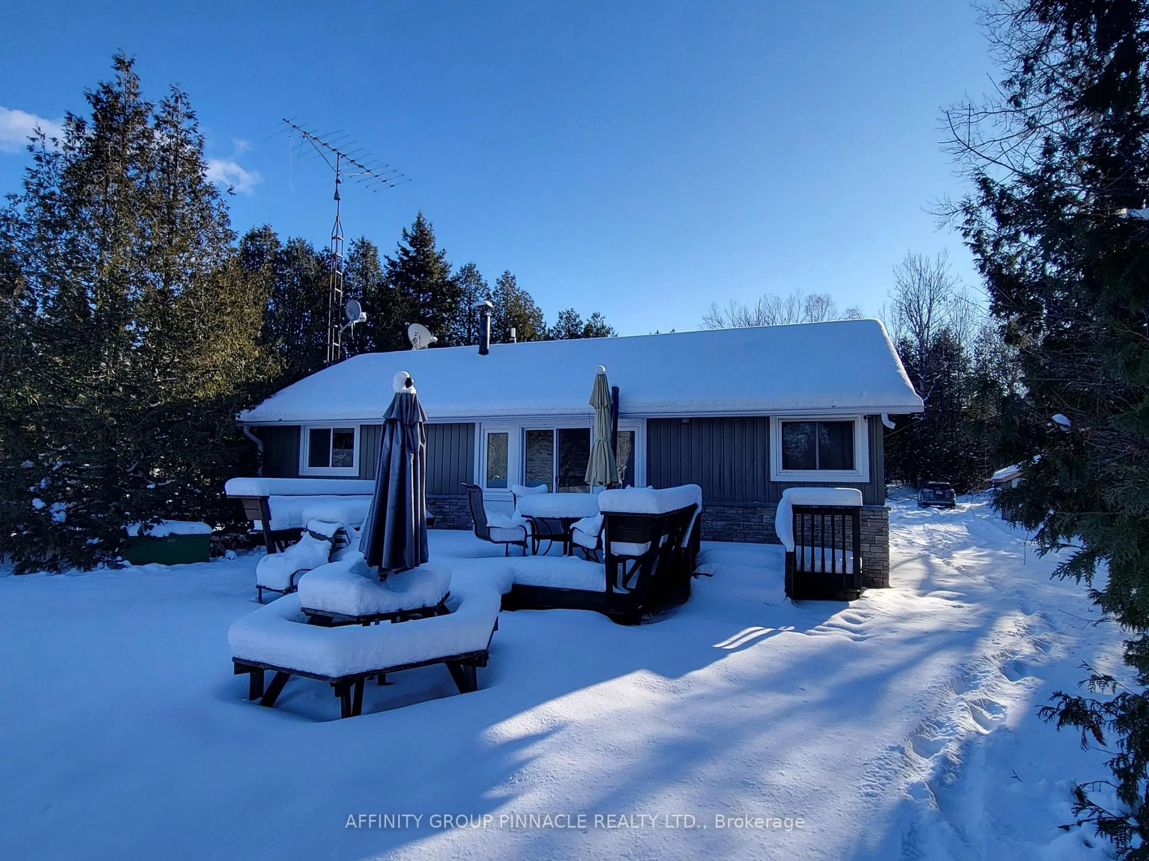 A pic from outside/outdoor area/front of a property/back of a property/a pic from drone, street for 2473 Selwyn Bay Lane, Selwyn Ontario K0L 2H0
