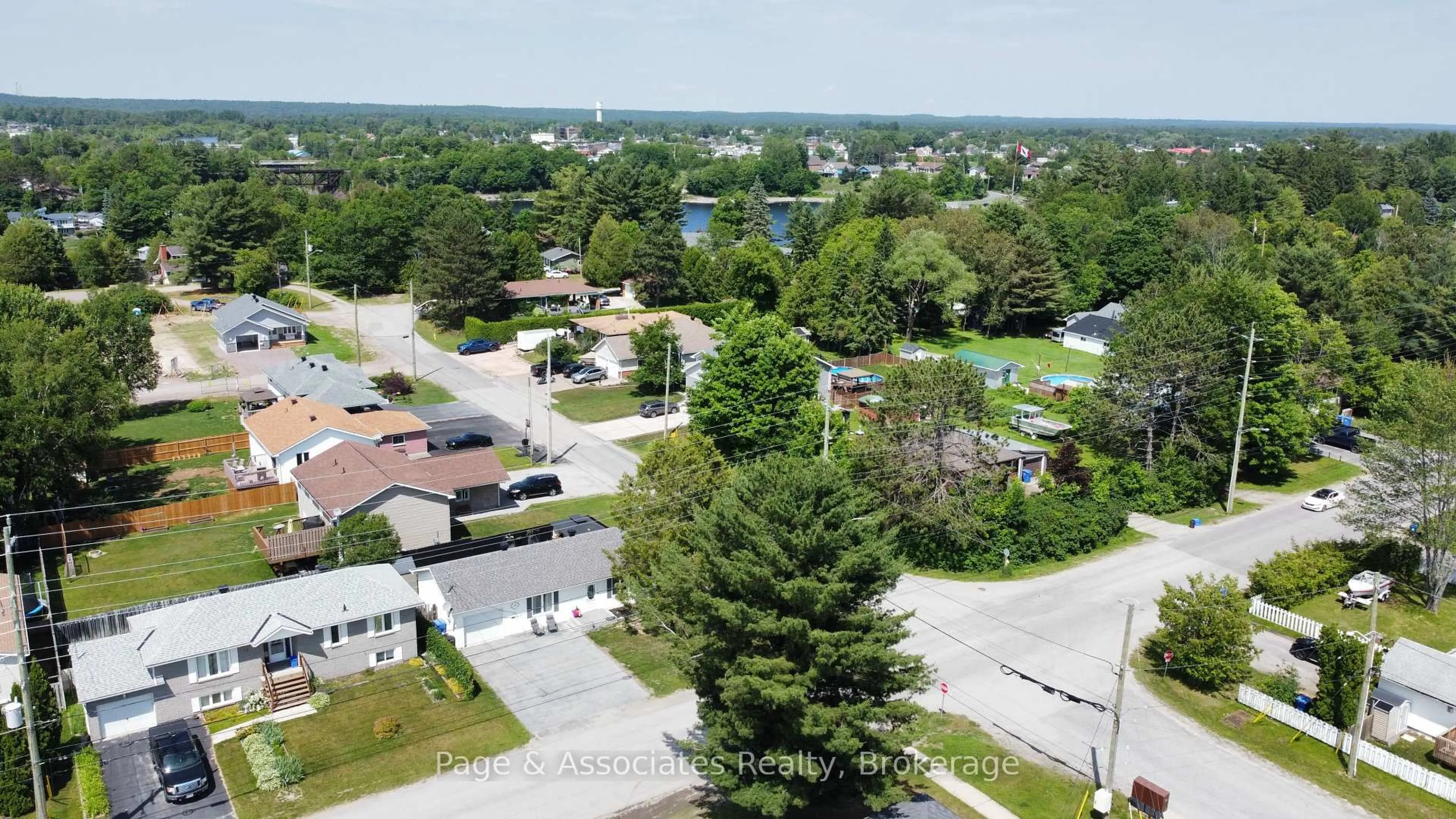 A pic from outside/outdoor area/front of a property/back of a property/a pic from drone, water/lake/river/ocean view for 17 Third St, West Nipissing Ontario P2B 3E6