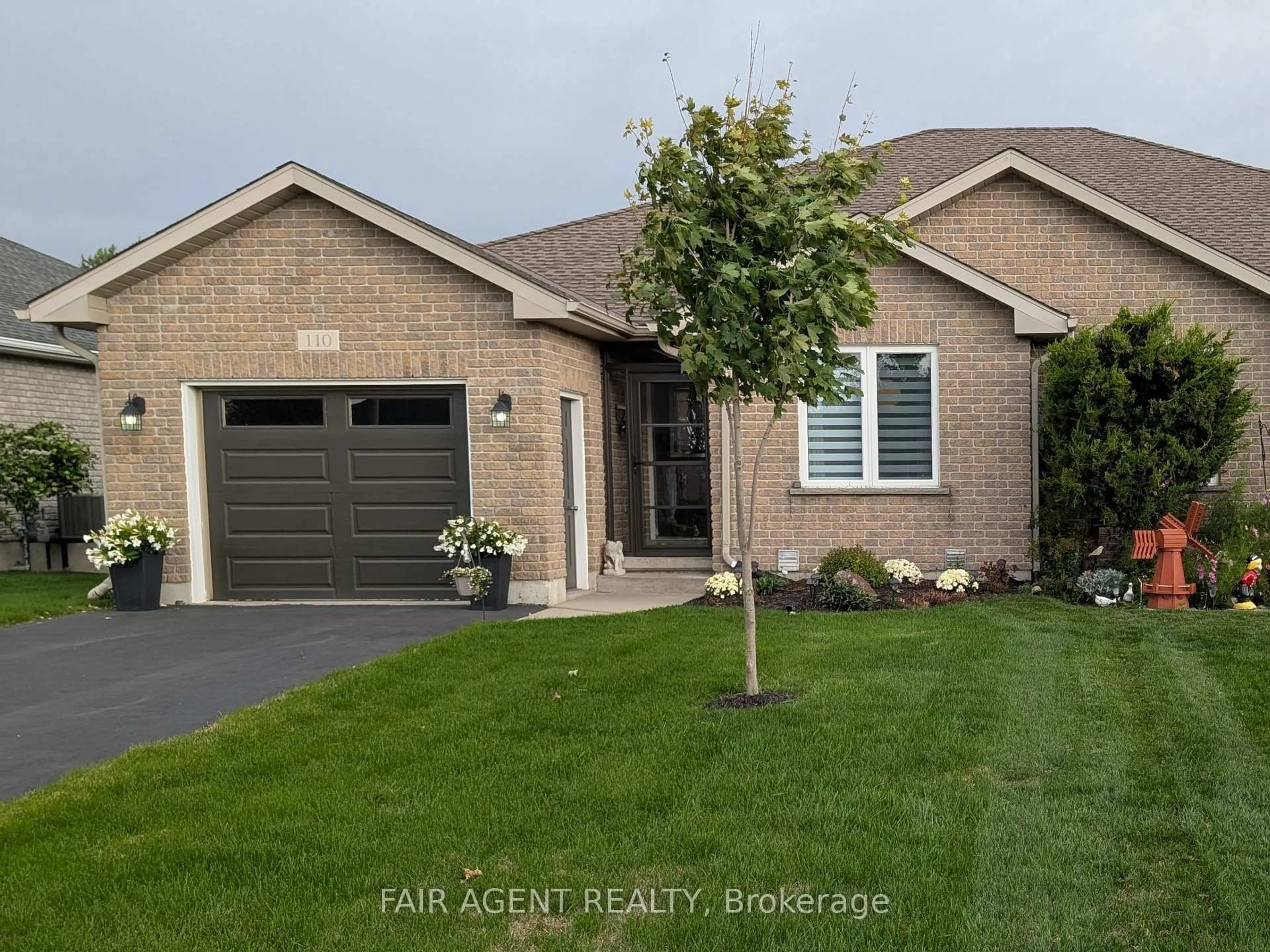 Home with brick exterior material, street for 110 MILTON SEILER Cres, Minto Ontario N0G 2P0
