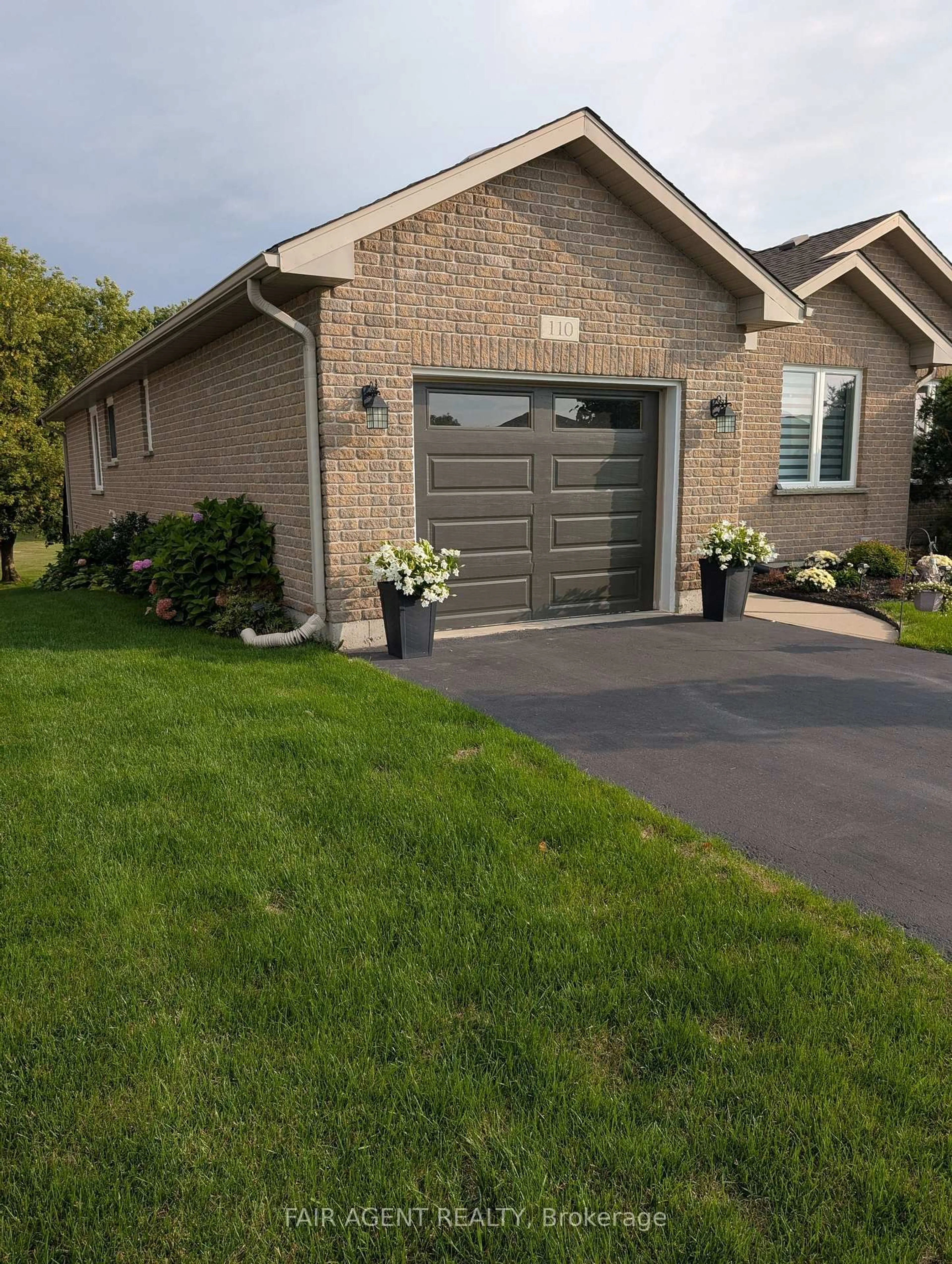 Home with vinyl exterior material, street for 110 MILTON SEILER Cres, Minto Ontario N0G 2P0