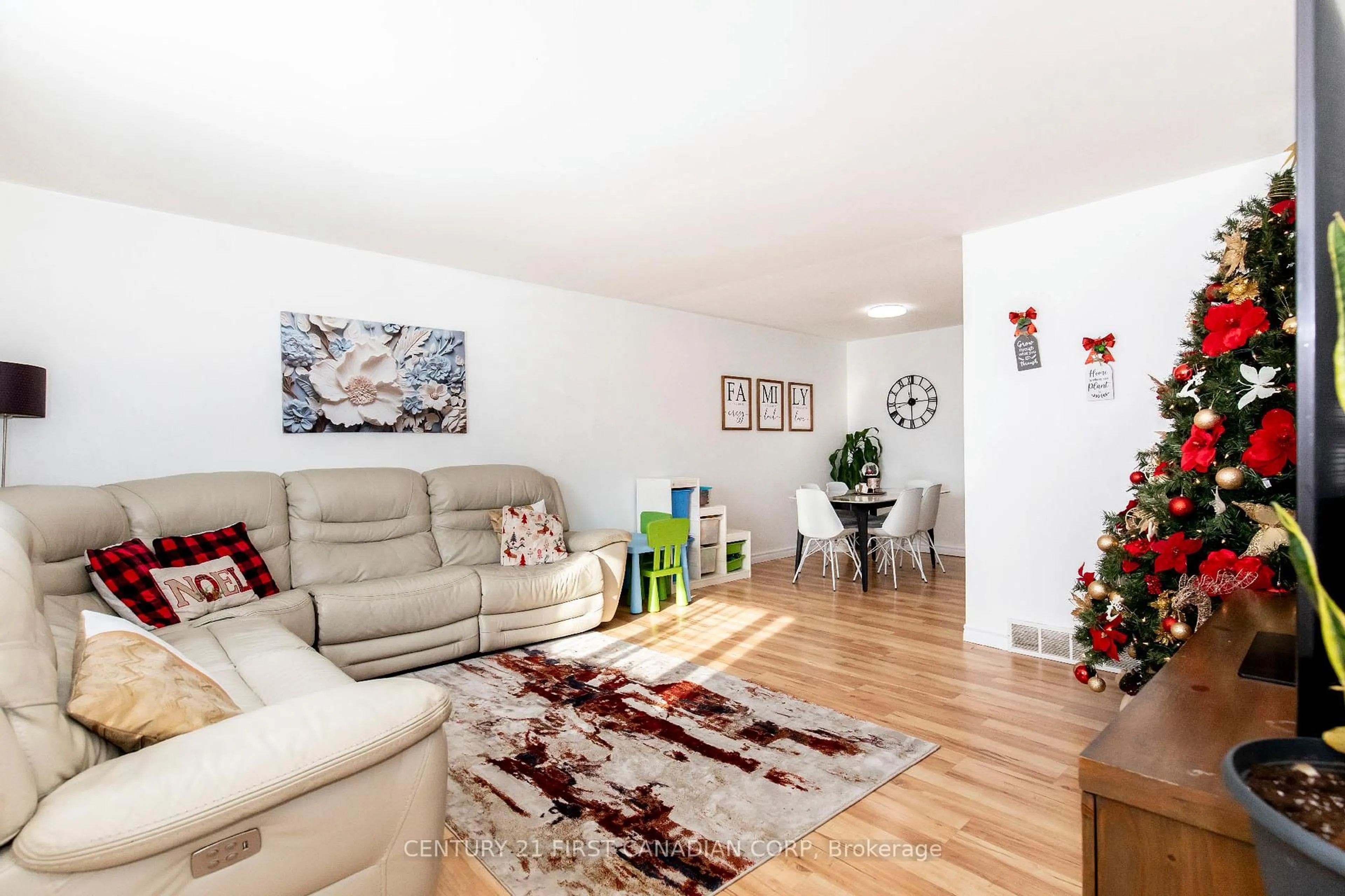 Living room with furniture, wood/laminate floor for 12 Noel Ave, London East Ontario N5V 1A9