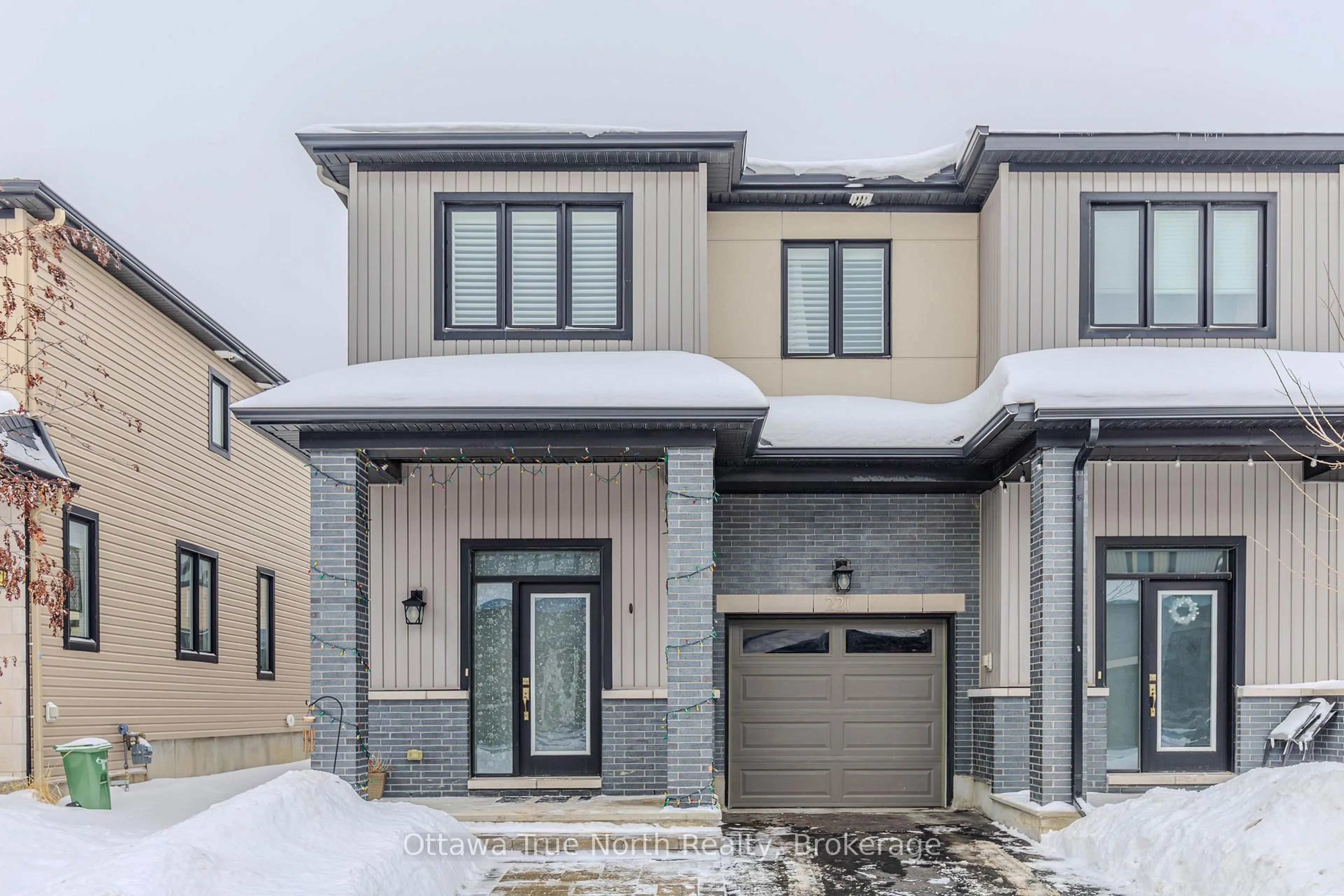 Home with brick exterior material, street for 221 Don Brown Private, Ottawa Ontario K2M 0A8