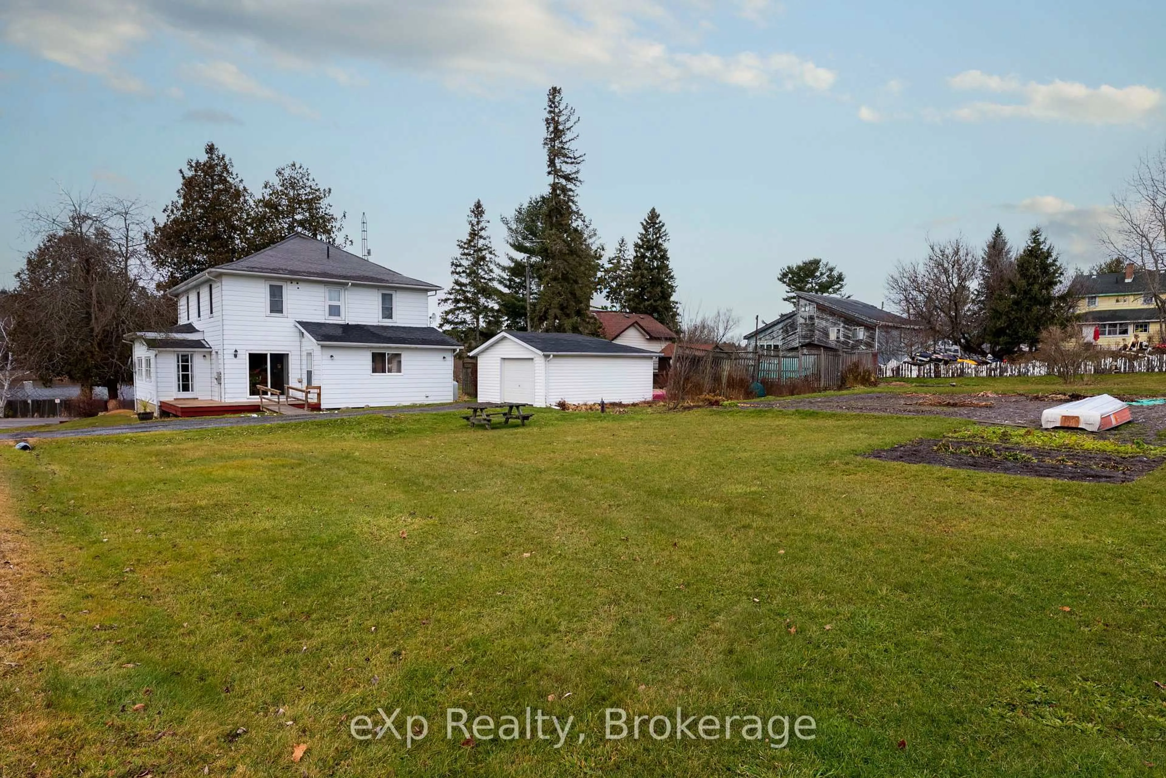 A pic from outside/outdoor area/front of a property/back of a property/a pic from drone, water/lake/river/ocean view for 2 Henry St, McKellar Ontario P0G 1C0