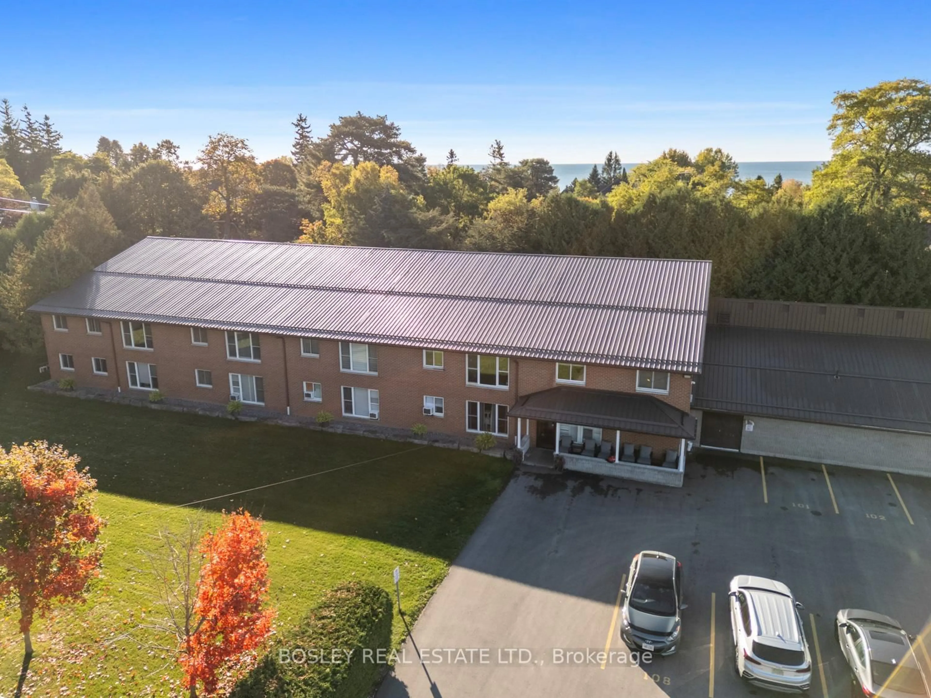 A pic from outside/outdoor area/front of a property/back of a property/a pic from drone, water/lake/river/ocean view for 133 Ontario St #201, Cobourg Ontario K9A 3B4