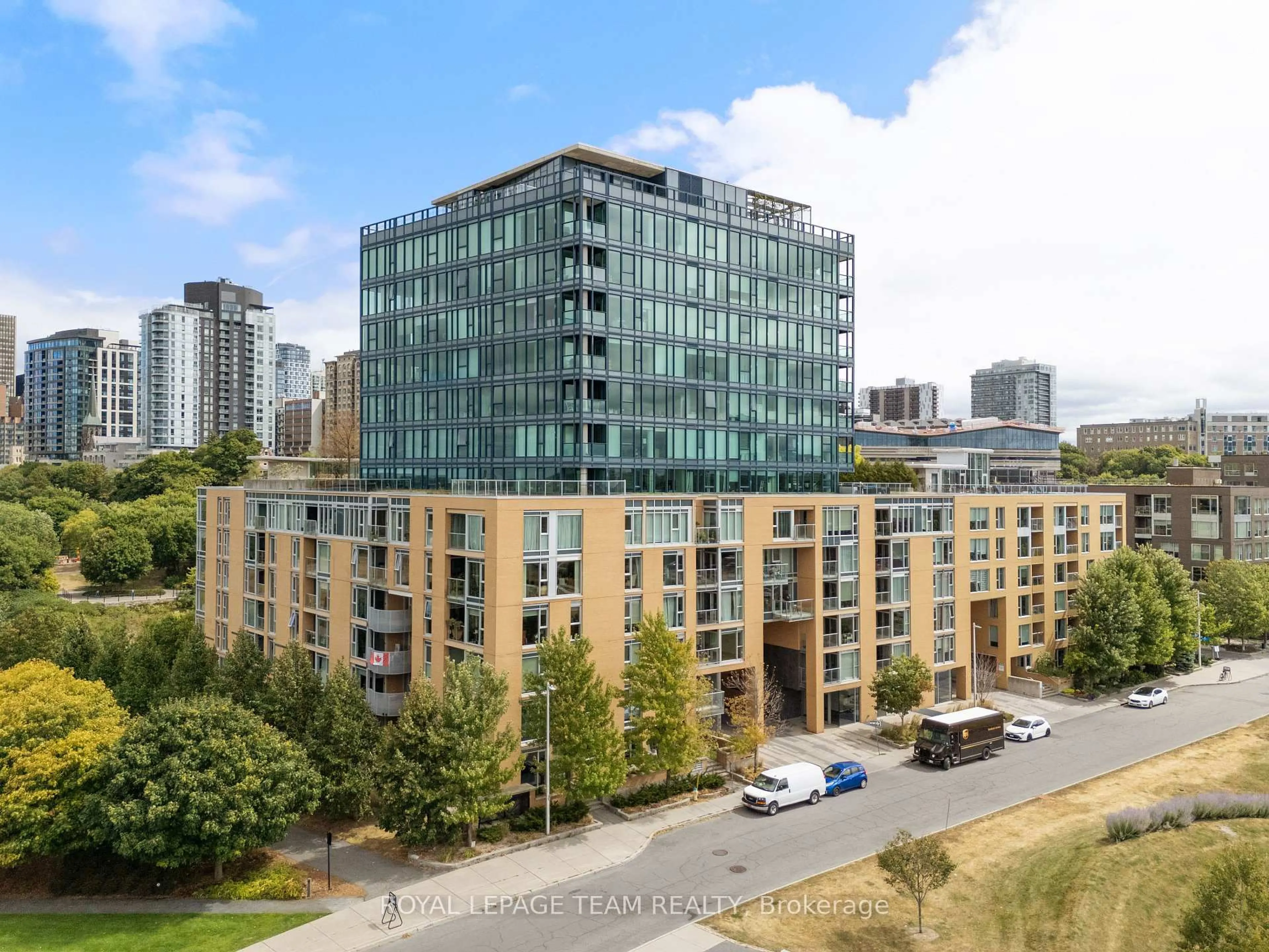 A pic from outside/outdoor area/front of a property/back of a property/a pic from drone, city buildings view from balcony for 200 Lett St #303, Ottawa Ontario K1R 0A7