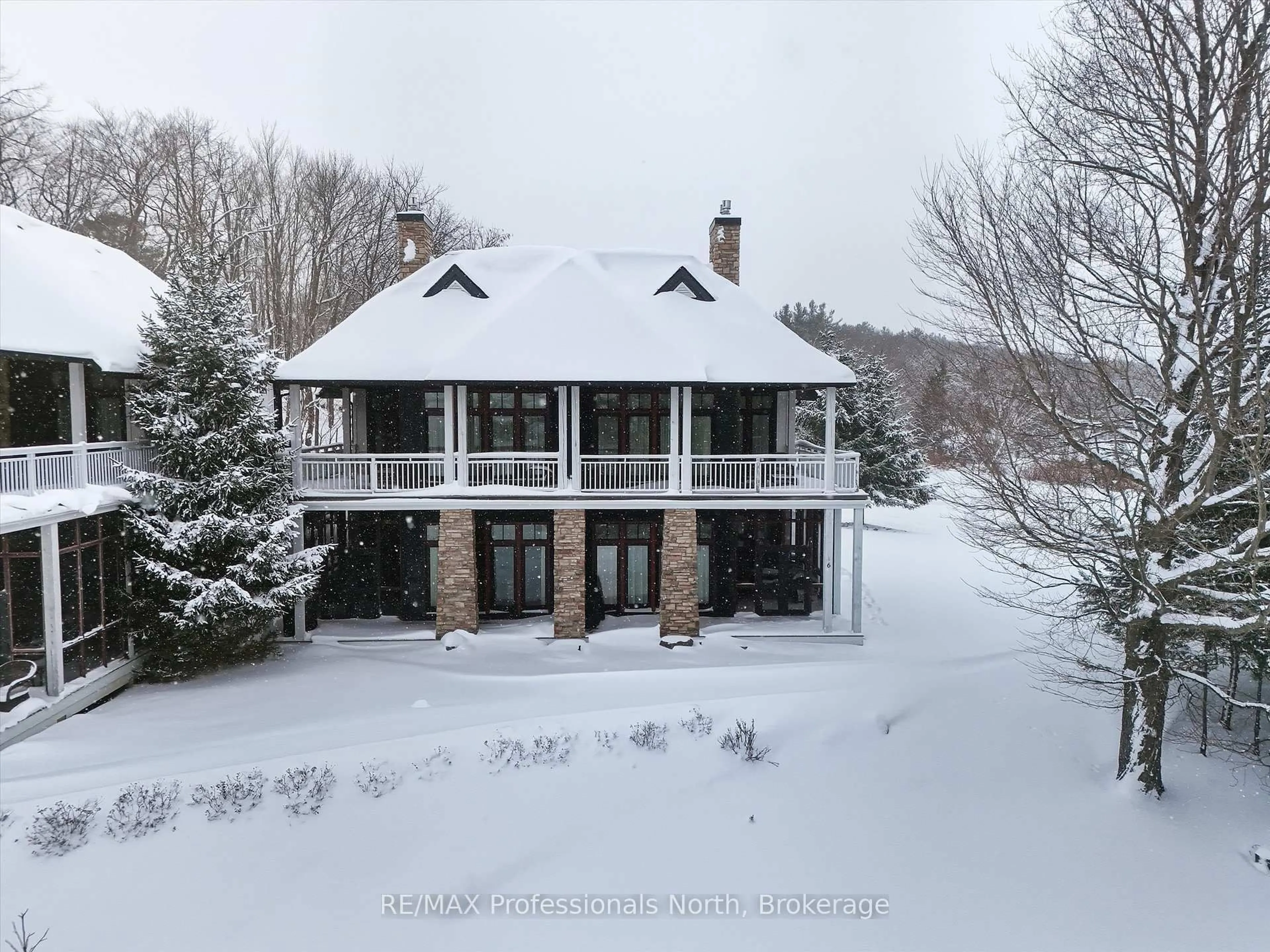 A pic from outside/outdoor area/front of a property/back of a property/a pic from drone, water/lake/river/ocean view for 1003 Matthews Dr #C6 5B, Muskoka Lakes Ontario P0B 1P0
