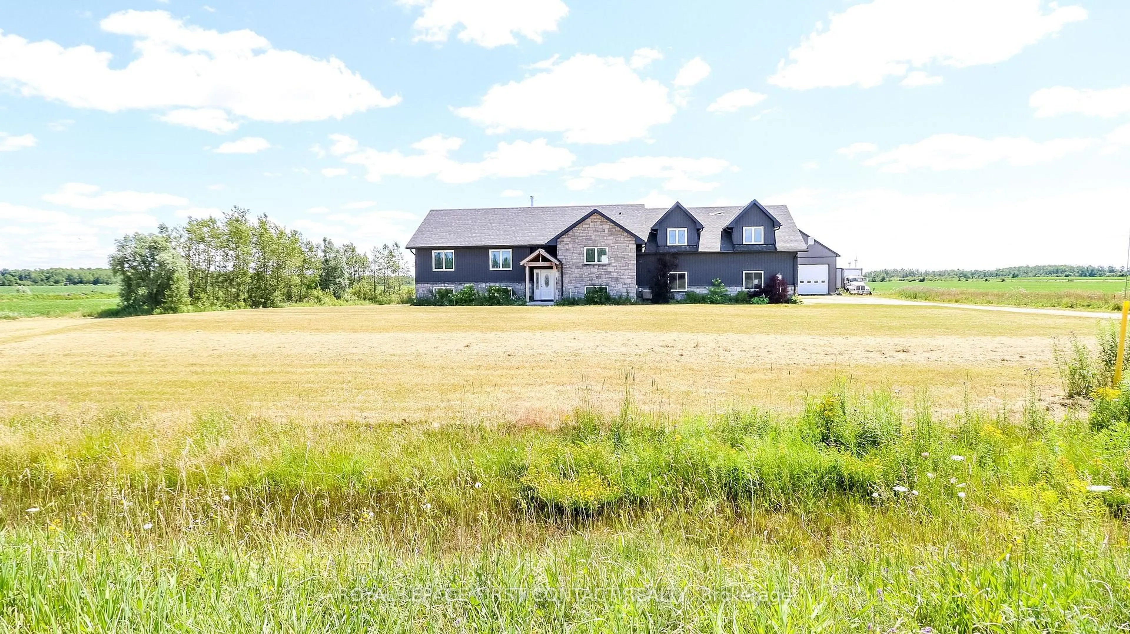 A pic from outside/outdoor area/front of a property/back of a property/a pic from drone, water/lake/river/ocean view for 126734 Southgate Rd 12 Rd, Southgate Ontario N0C 1B0