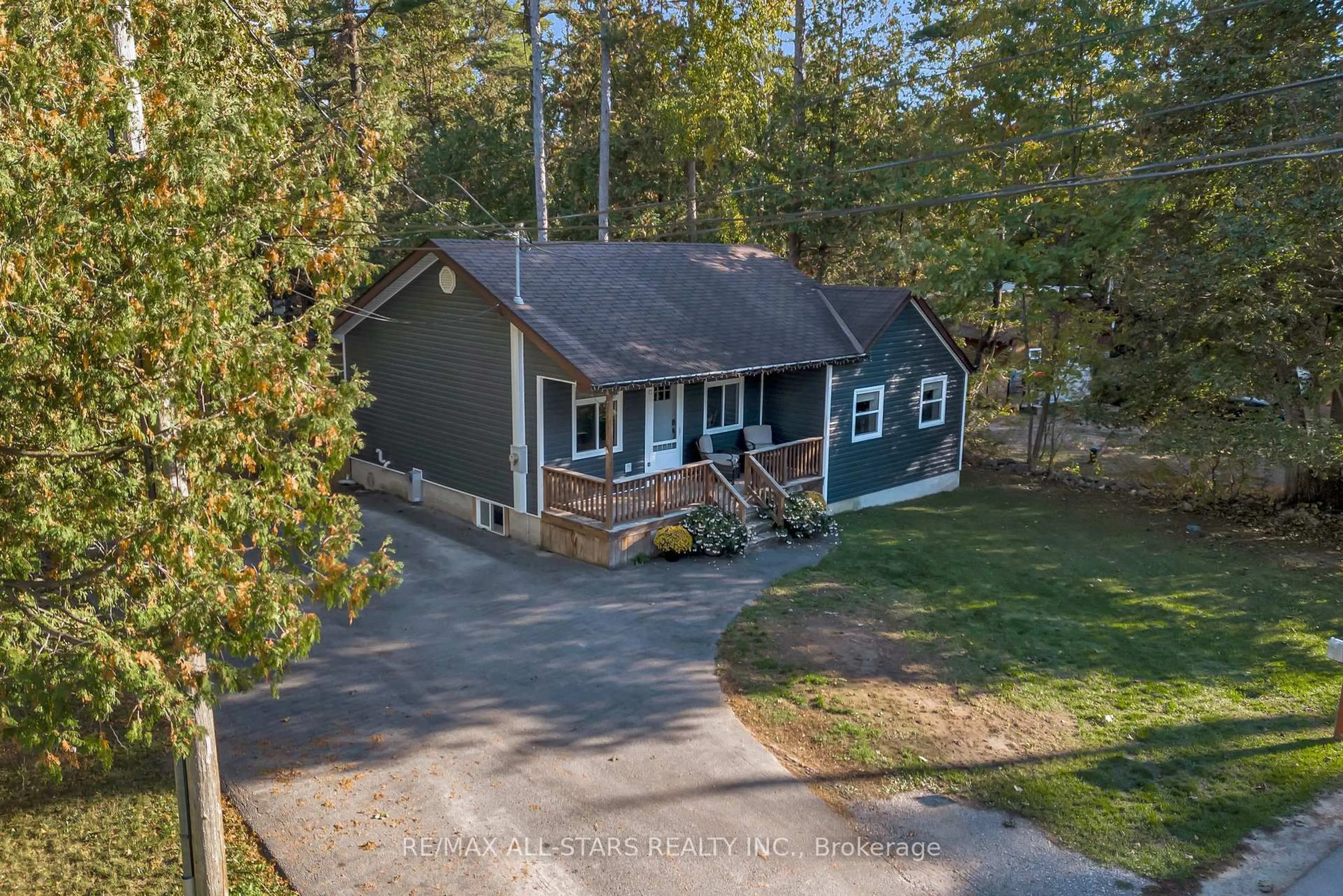 A pic from outside/outdoor area/front of a property/back of a property/a pic from drone, water/lake/river/ocean view for 16 Parkhill Dr, Kawartha Lakes Ontario K0M 1N0