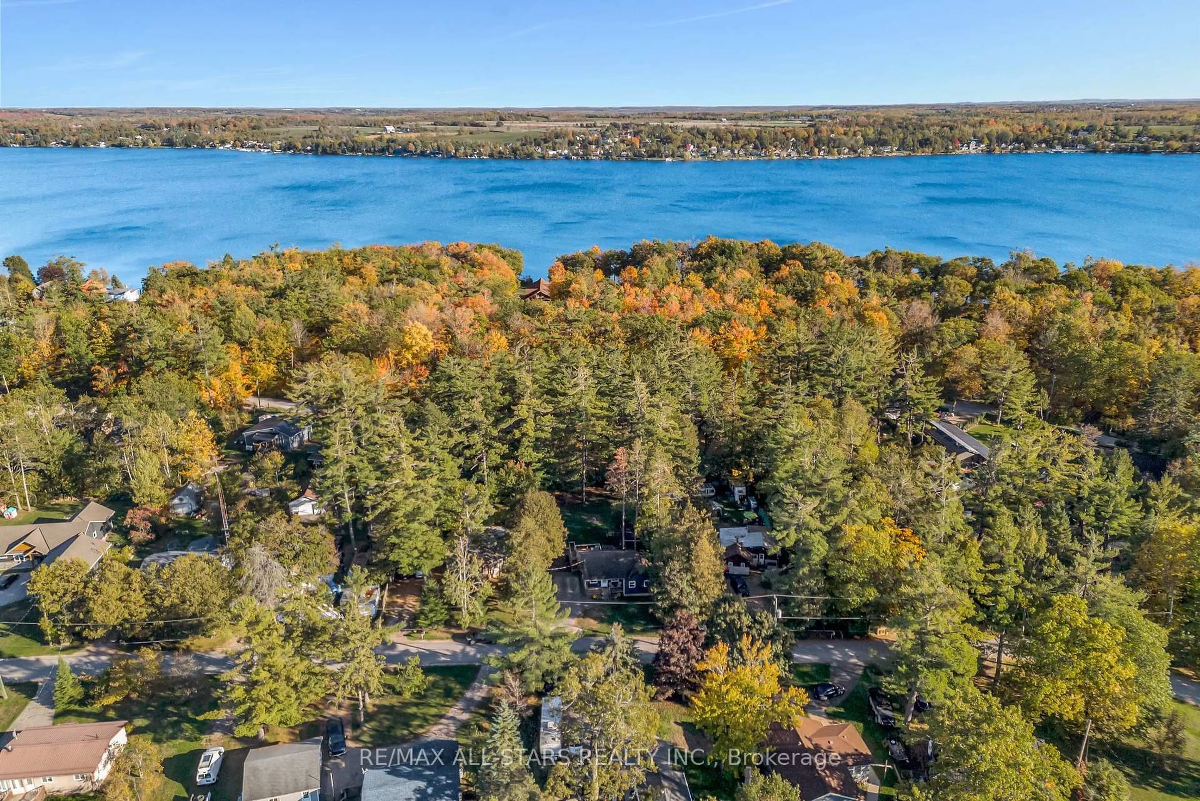 A pic from outside/outdoor area/front of a property/back of a property/a pic from drone, water/lake/river/ocean view for 16 Parkhill Dr, Kawartha Lakes Ontario K0M 1N0
