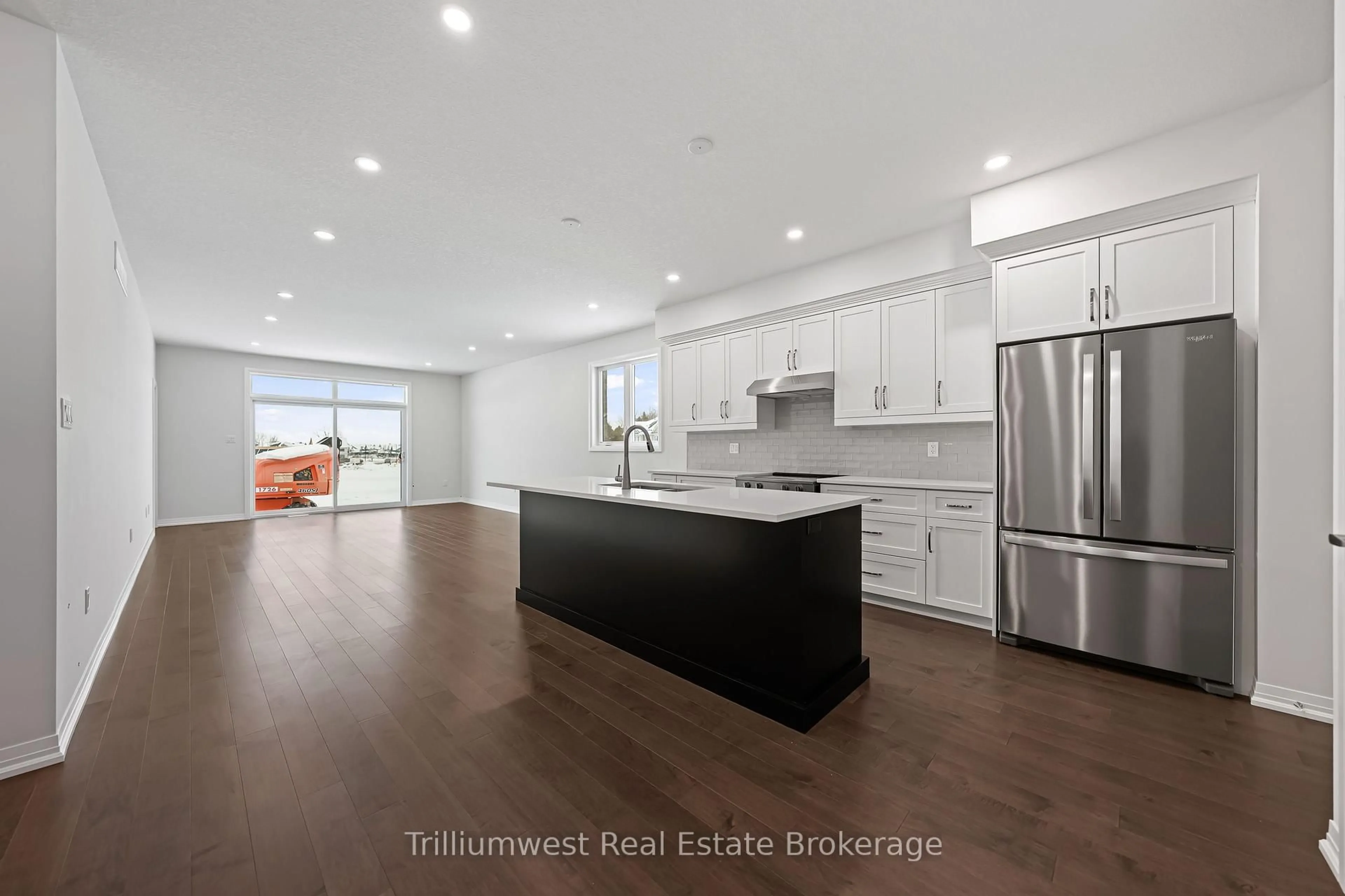 Open concept kitchen, wood/laminate floor for 273 Harrison St, Centre Wellington Ontario N0B 1S0