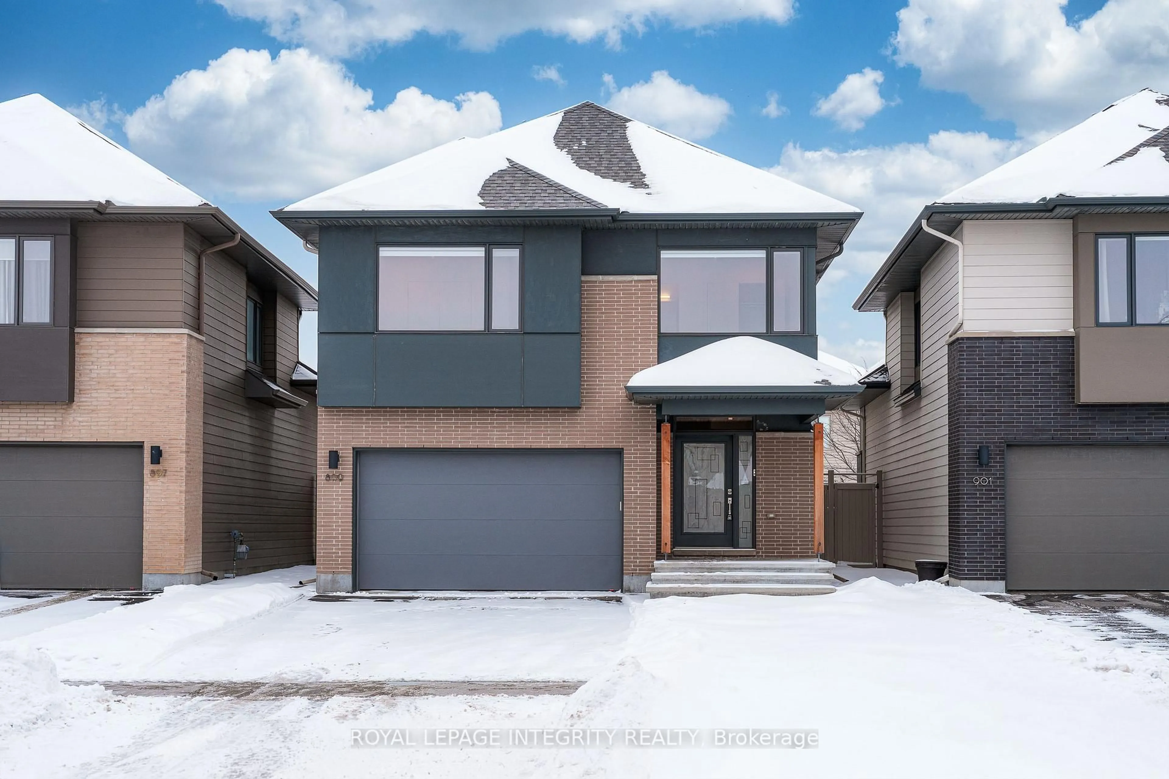 Home with brick exterior material, street for 899 Ralph Hennessy Ave, Ottawa Ontario K1X 0B1