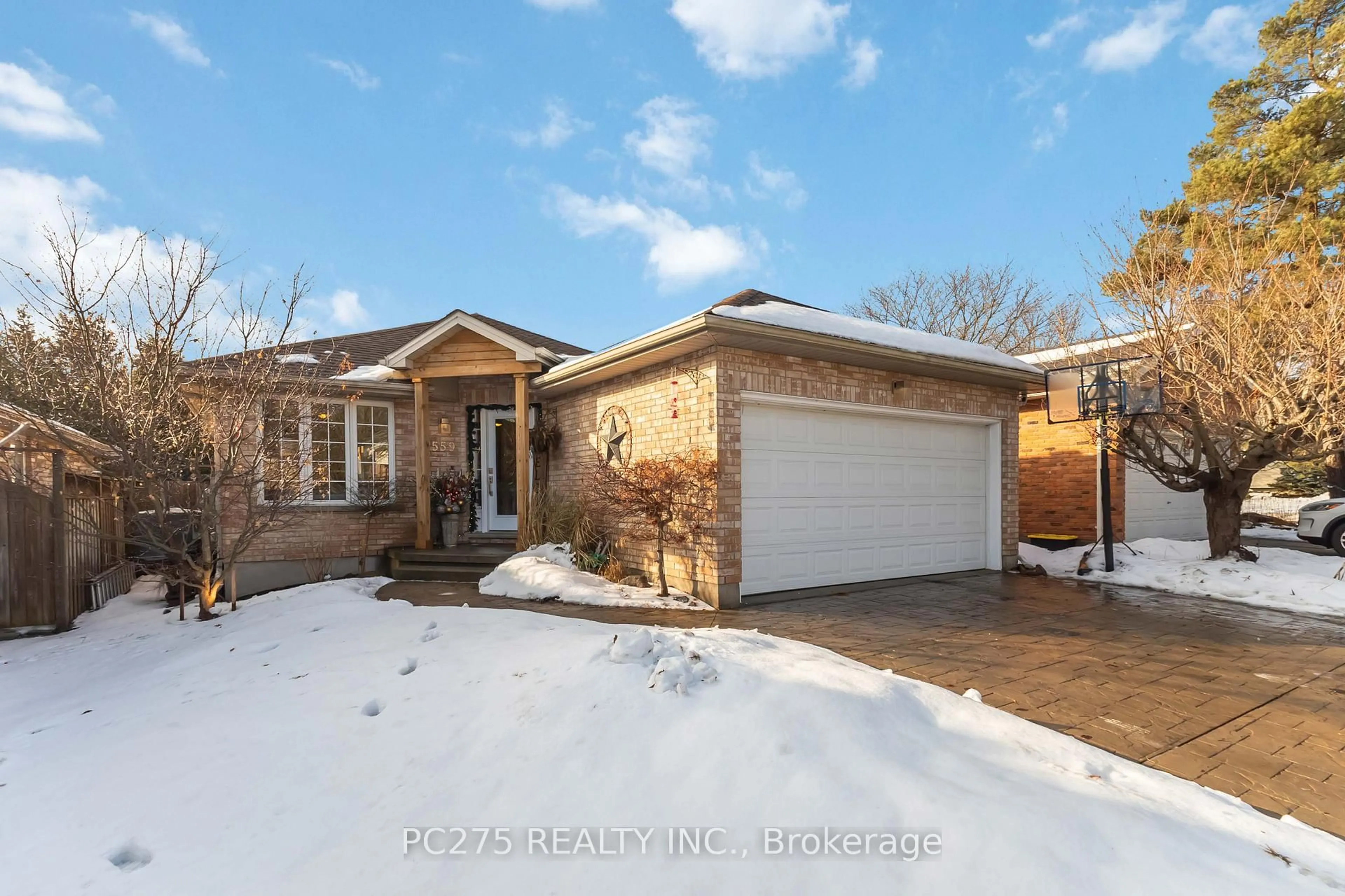 Home with brick exterior material, street for 559 Thornwood Dr, London North Ontario N6H 5S5