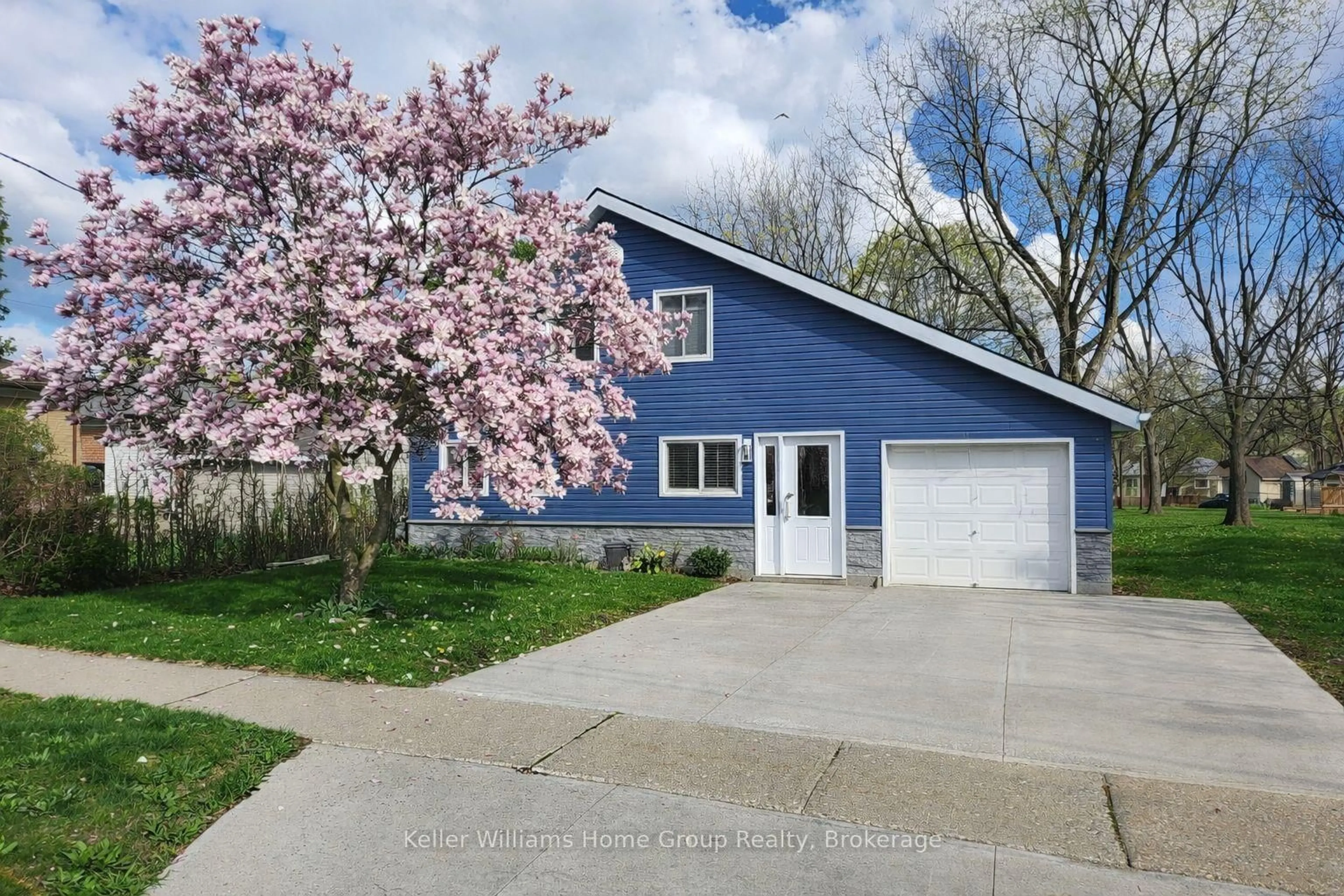 Home with vinyl exterior material, street for 7 Normandy Dr, Guelph Ontario N1E 2P2