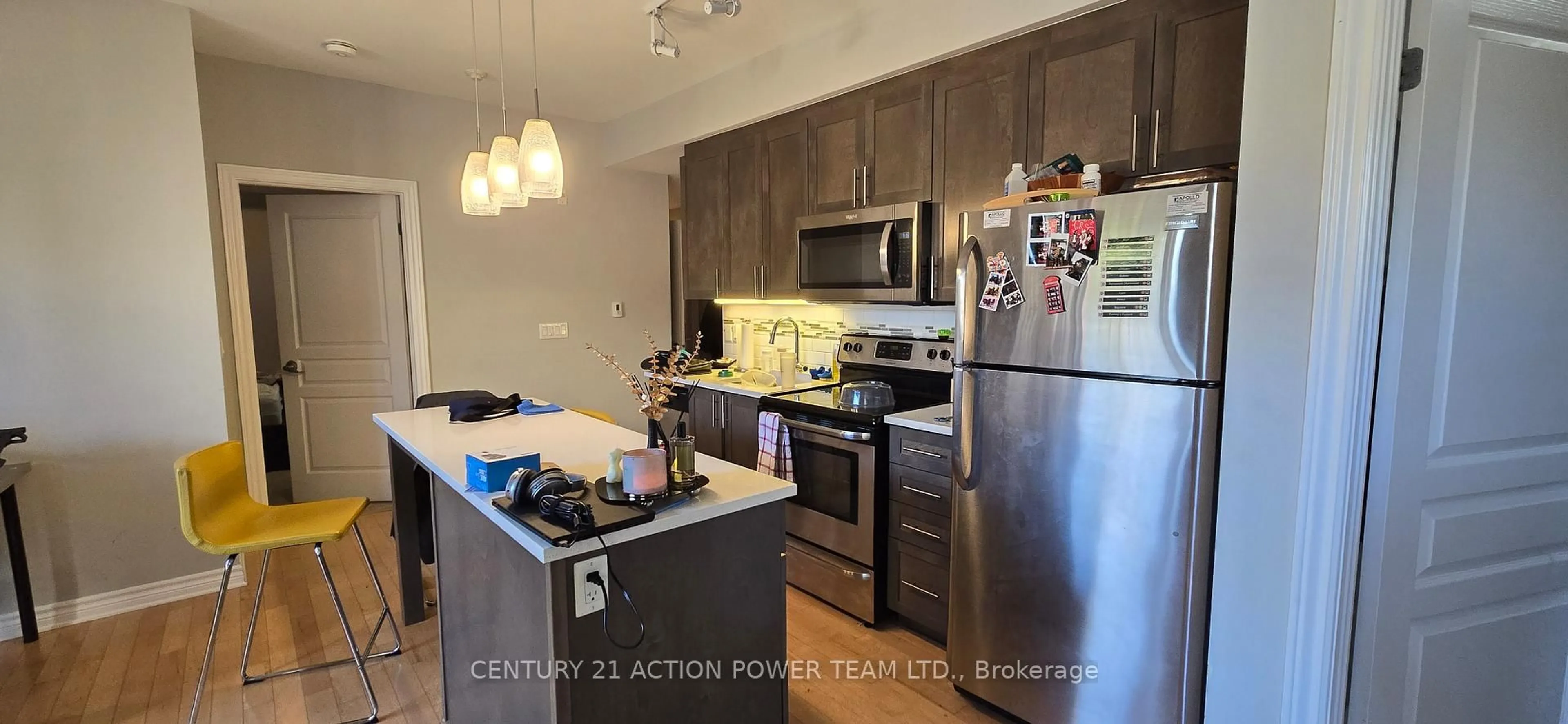 Open concept kitchen, wood/laminate floor for 755 Beauparc Private #104, Ottawa Ontario K1J 0A2
