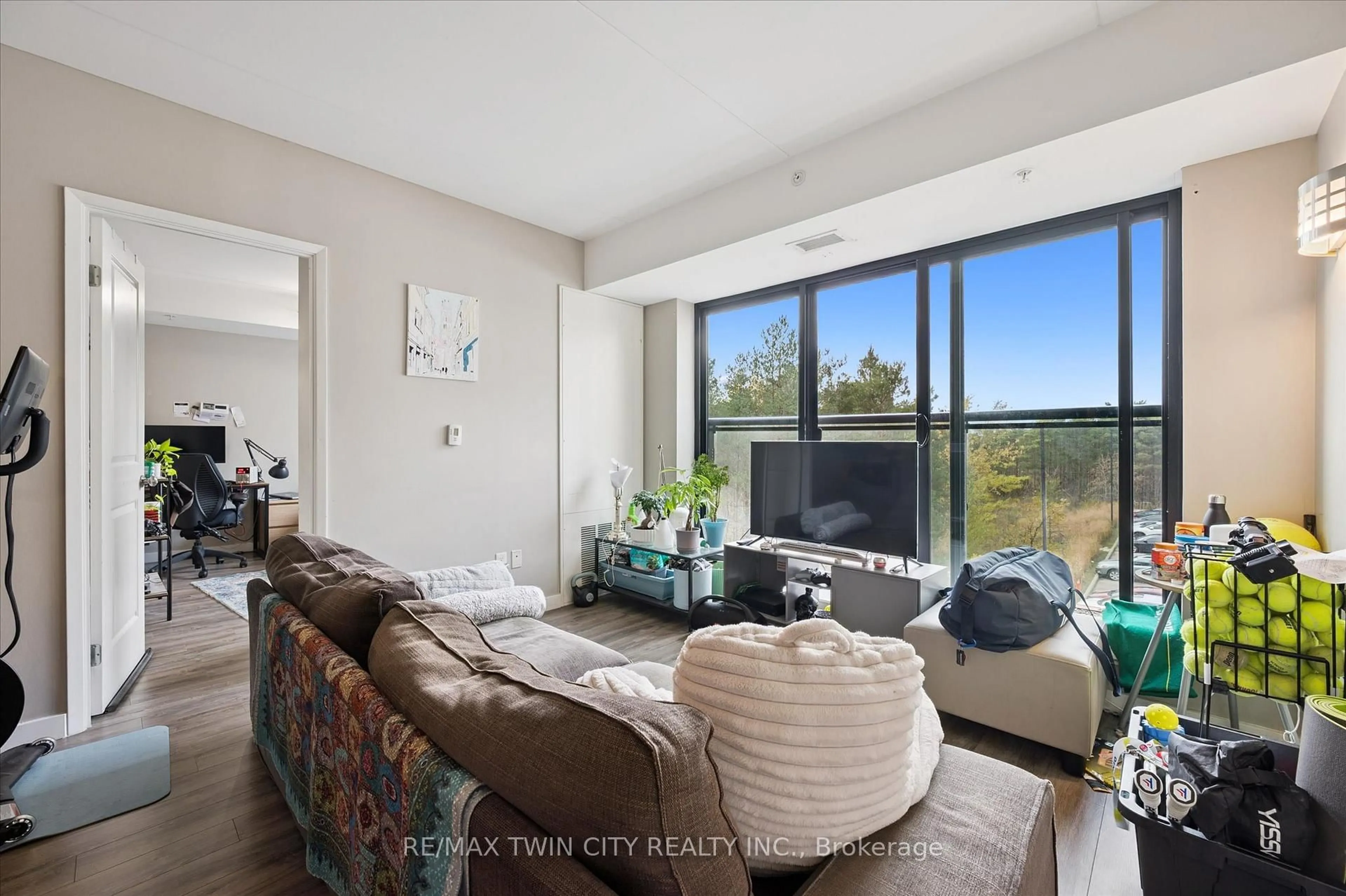 Living room with furniture, unknown for 1291 Gordon St #220, Guelph Ontario N1L 0M5