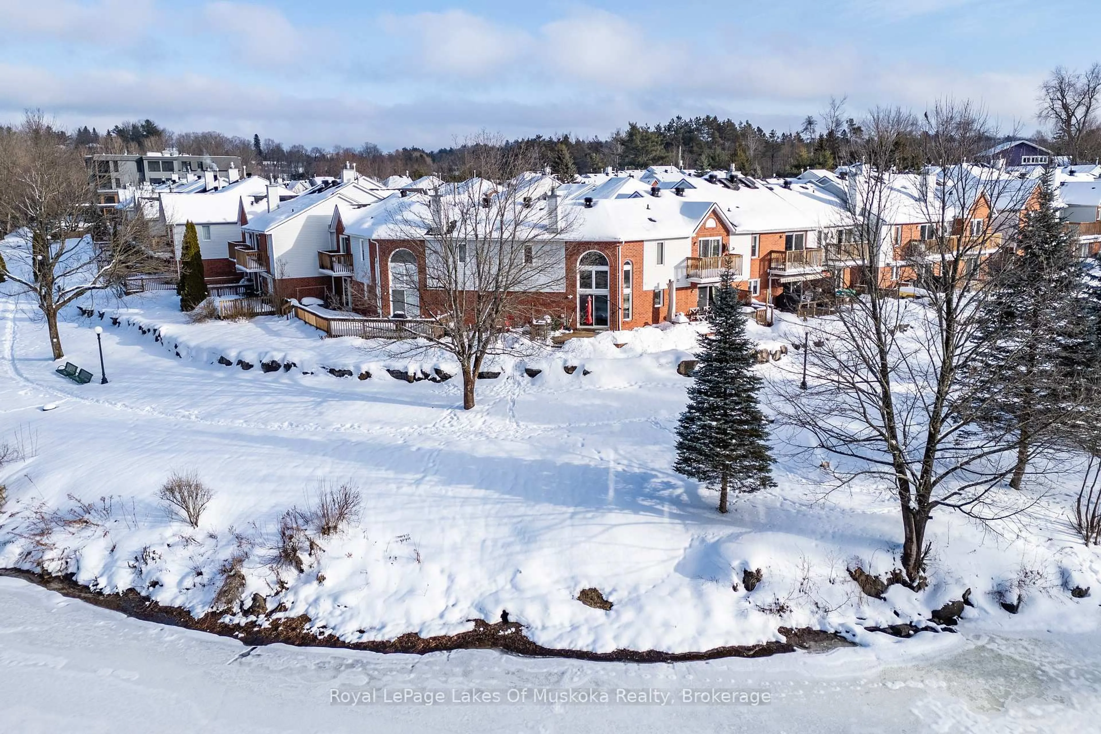 A pic from outside/outdoor area/front of a property/back of a property/a pic from drone, mountain view for 55 Shoreline Dr, Bracebridge Ontario P1L 1Z3