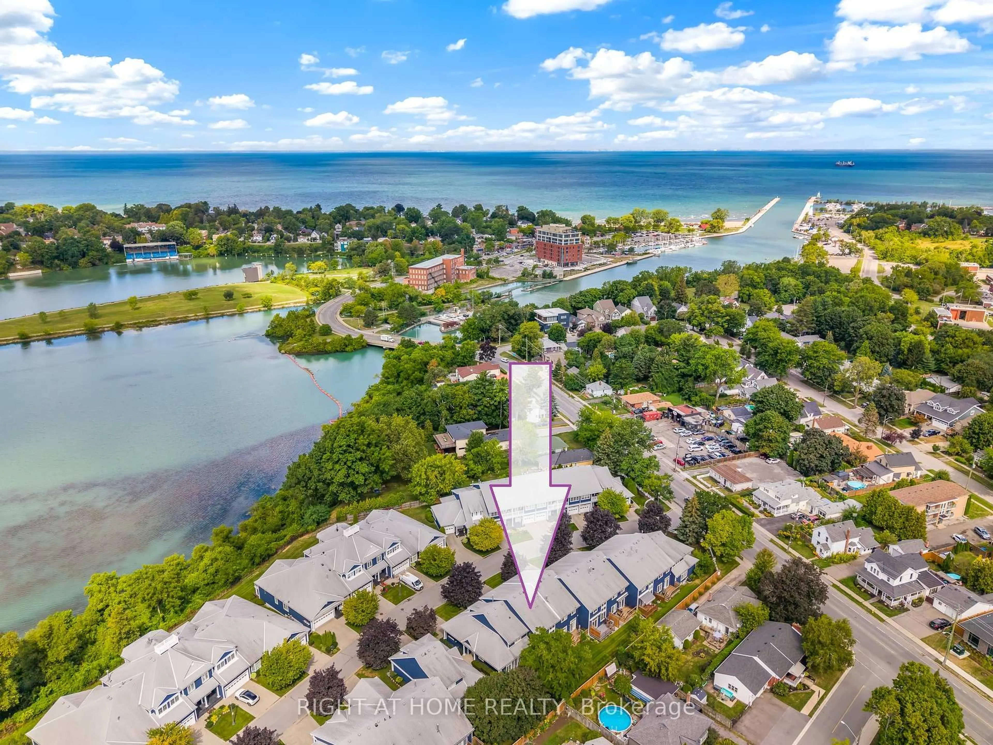 A pic from outside/outdoor area/front of a property/back of a property/a pic from drone, water/lake/river/ocean view for 88 Lakeport Rd #33, St. Catharines Ontario L2N 4P8