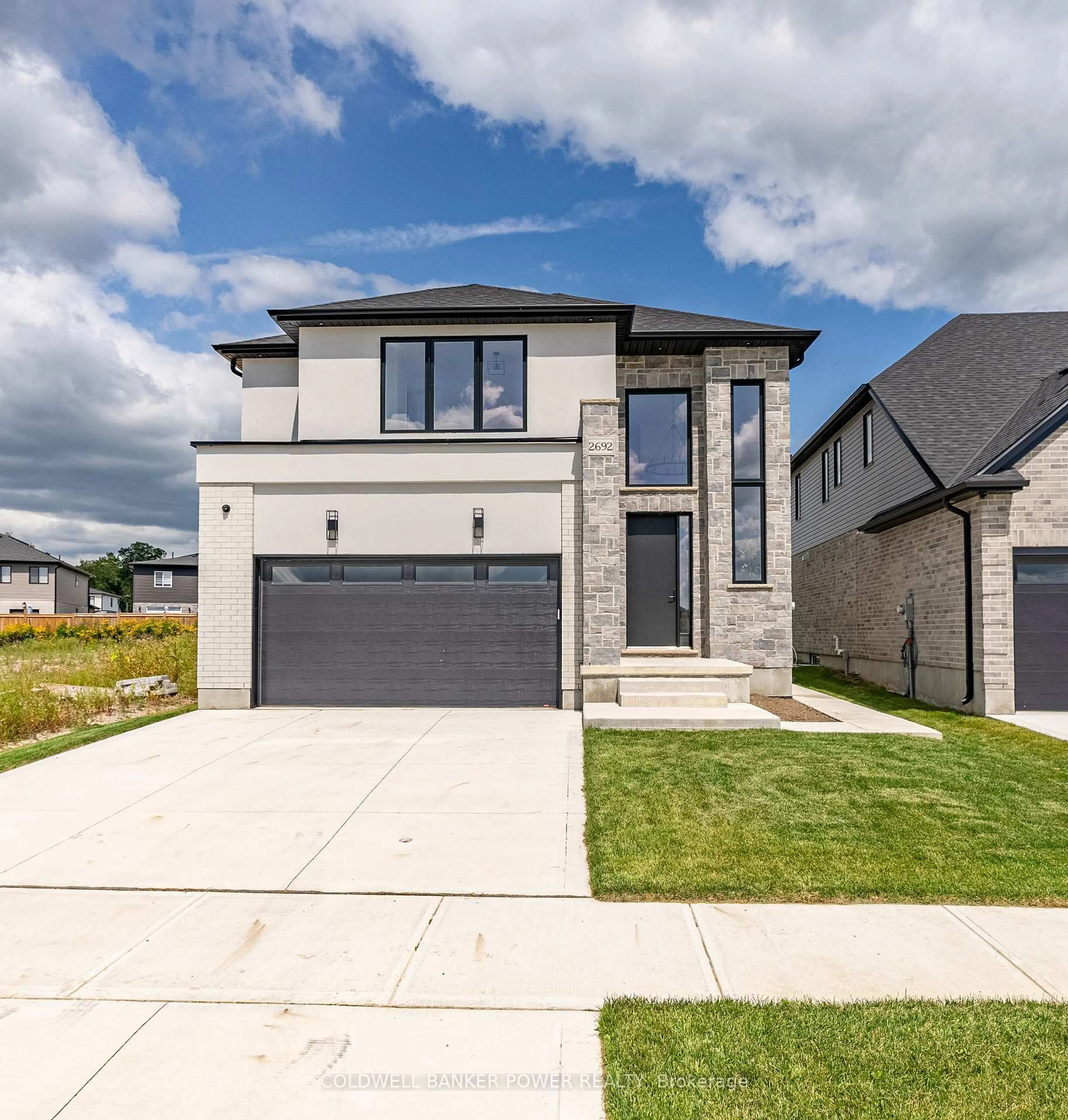 Home with brick exterior material, street for 2692 HEARDCREEK Tr, London North Ontario N6G 0W1