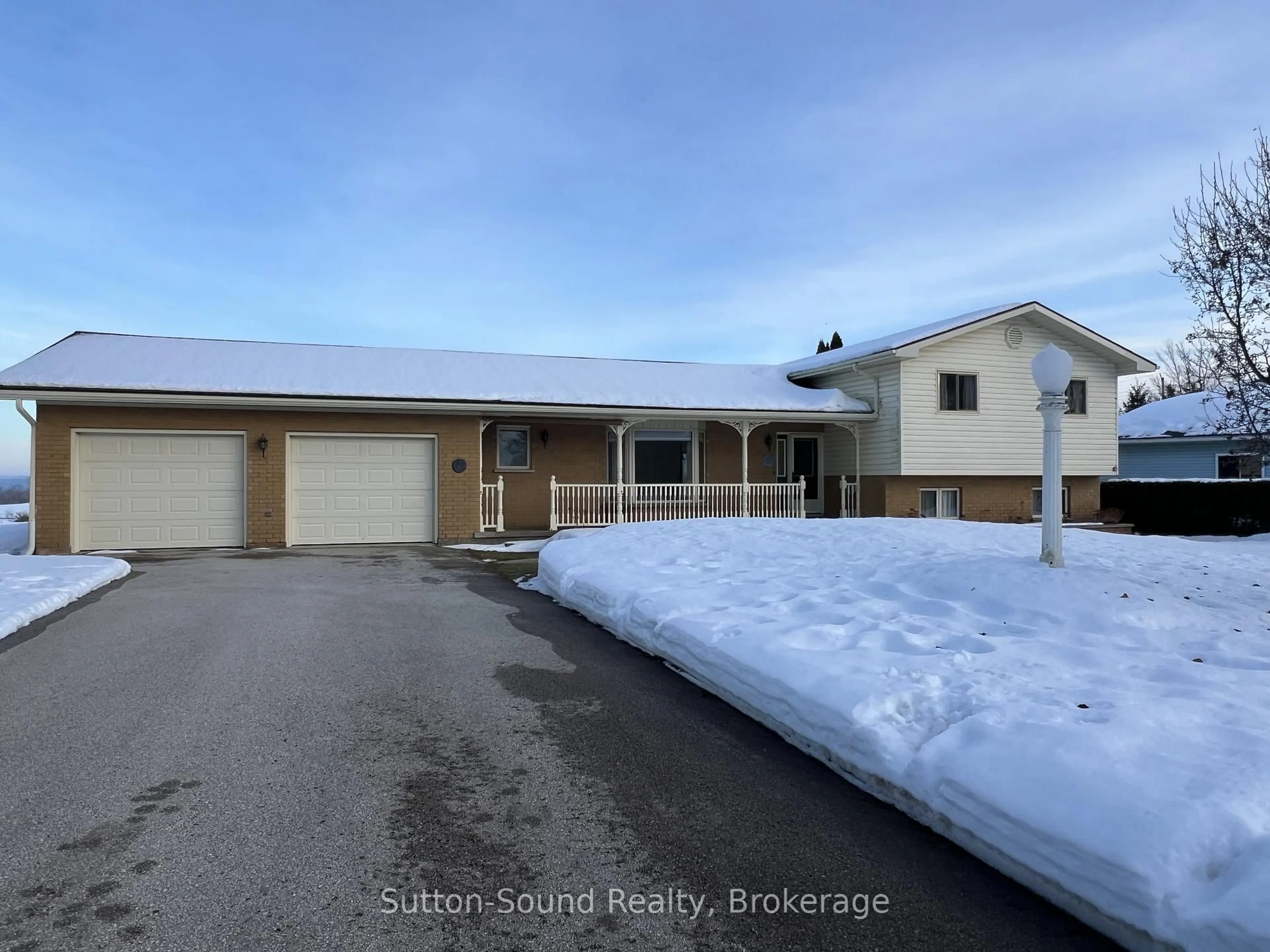 A pic from outside/outdoor area/front of a property/back of a property/a pic from drone, street for 178463 Grey Rd 17 Rd, Georgian Bluffs Ontario N4K 5N4