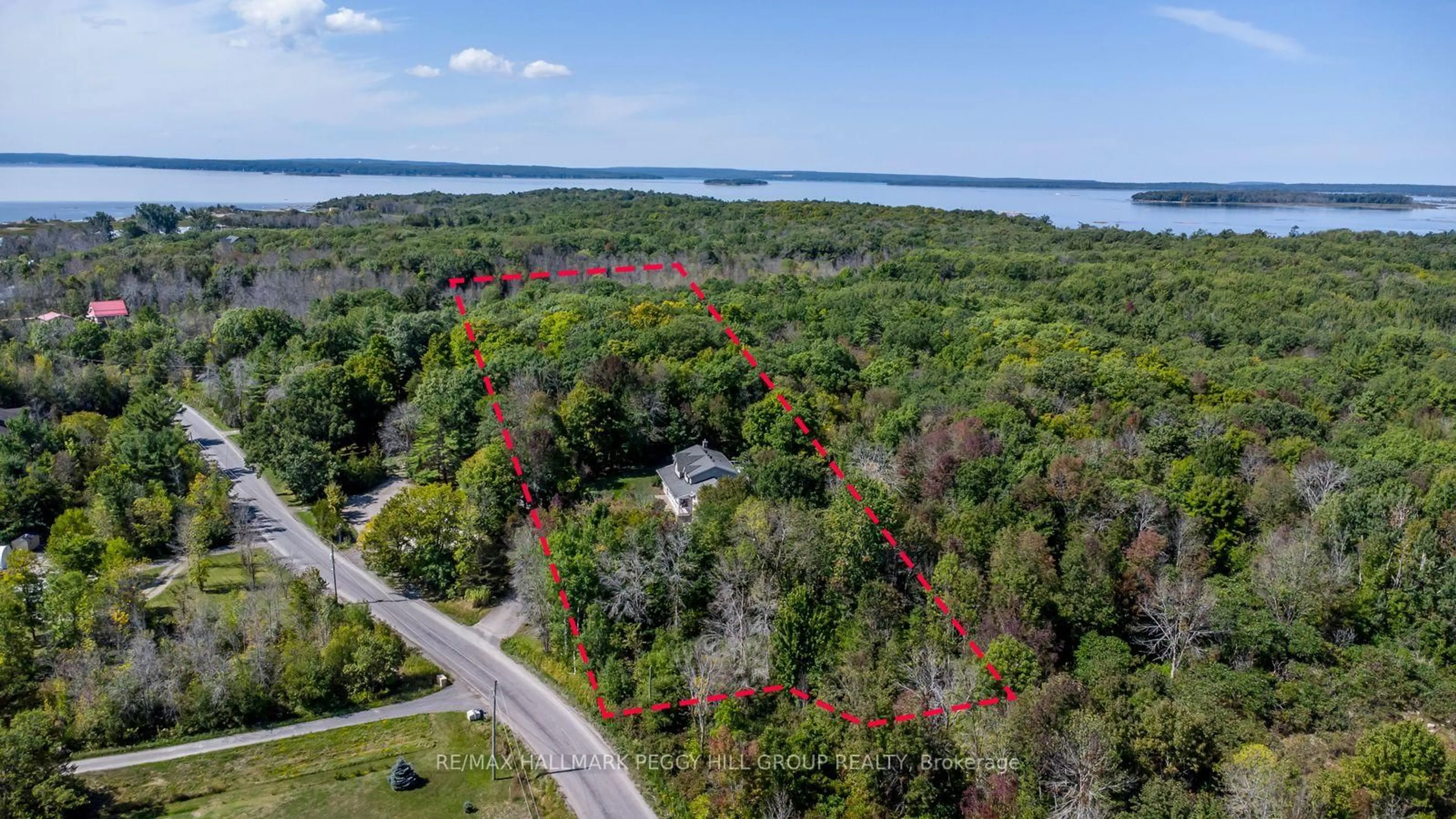 A pic from outside/outdoor area/front of a property/back of a property/a pic from drone, water/lake/river/ocean view for 106 Musky Bay Rd, Georgian Bay Ontario L0K 1S0