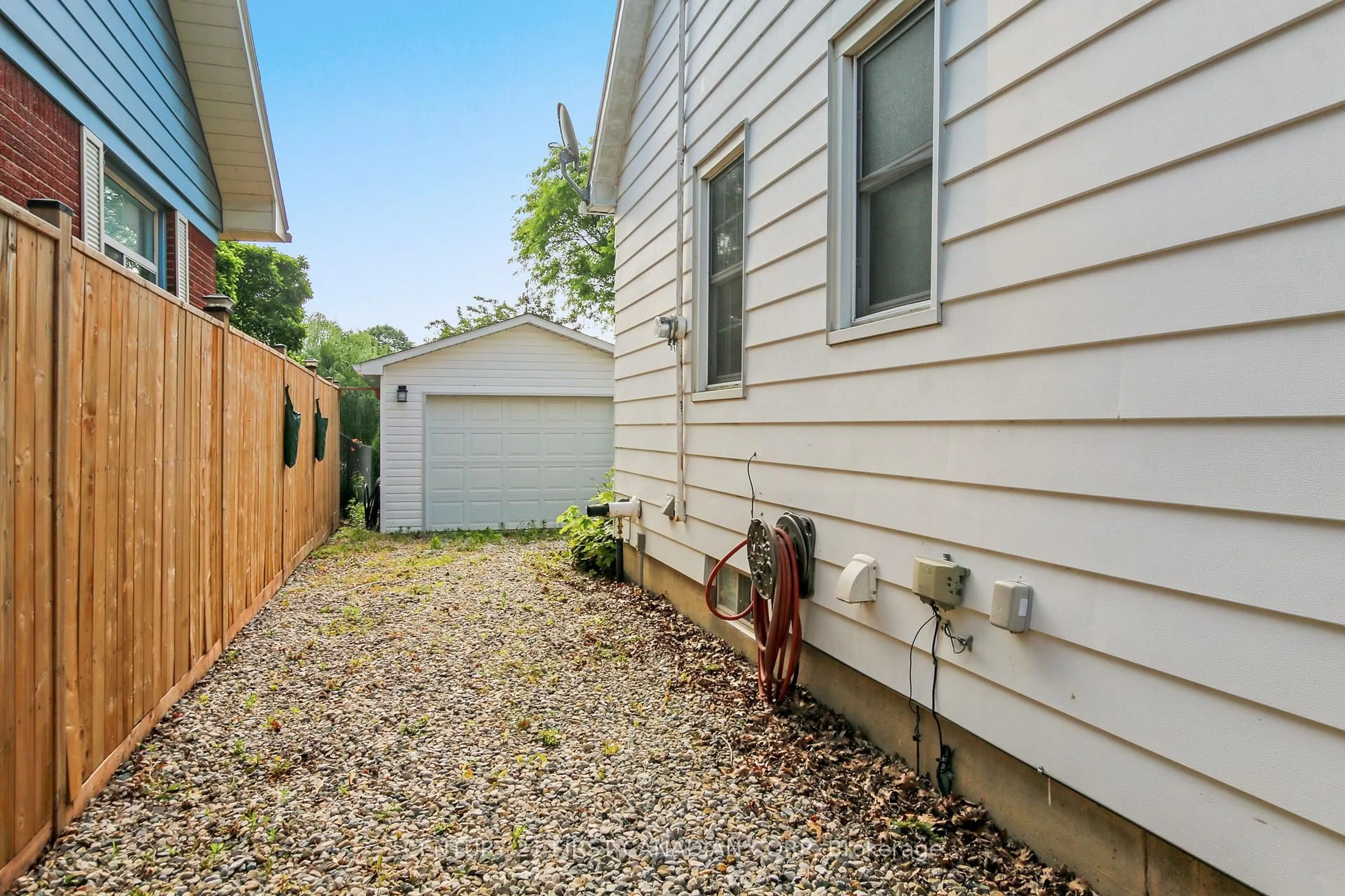 Home with vinyl exterior material, street for 26 Grand Ave, Chatham-Kent Ontario N8A 4J9