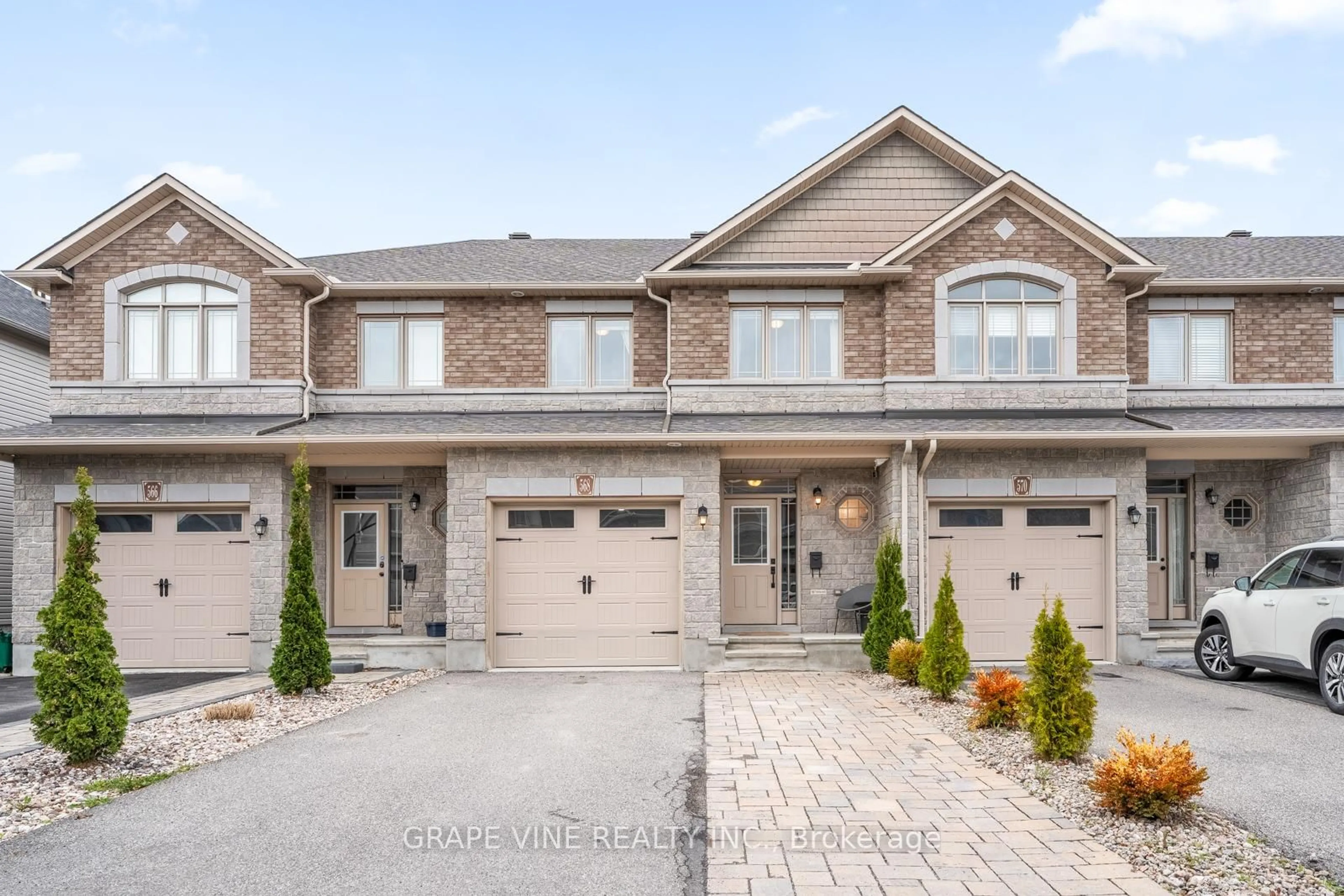 Home with brick exterior material, street for 568 Voie Du Pin Rouge Way, Ottawa Ontario K1W 0C4